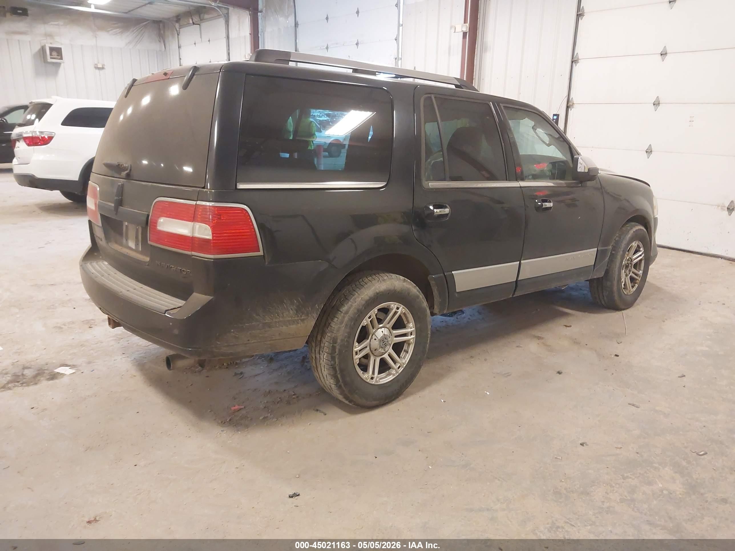 2010 Lincoln Navigator   Black vin: 5LMJJ2J58AEJ05406