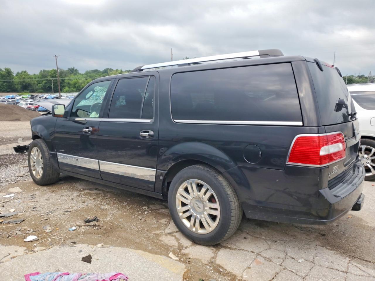 2012 Lincoln Navigator L Черный vin: 5LMJJ3J51CEL08663