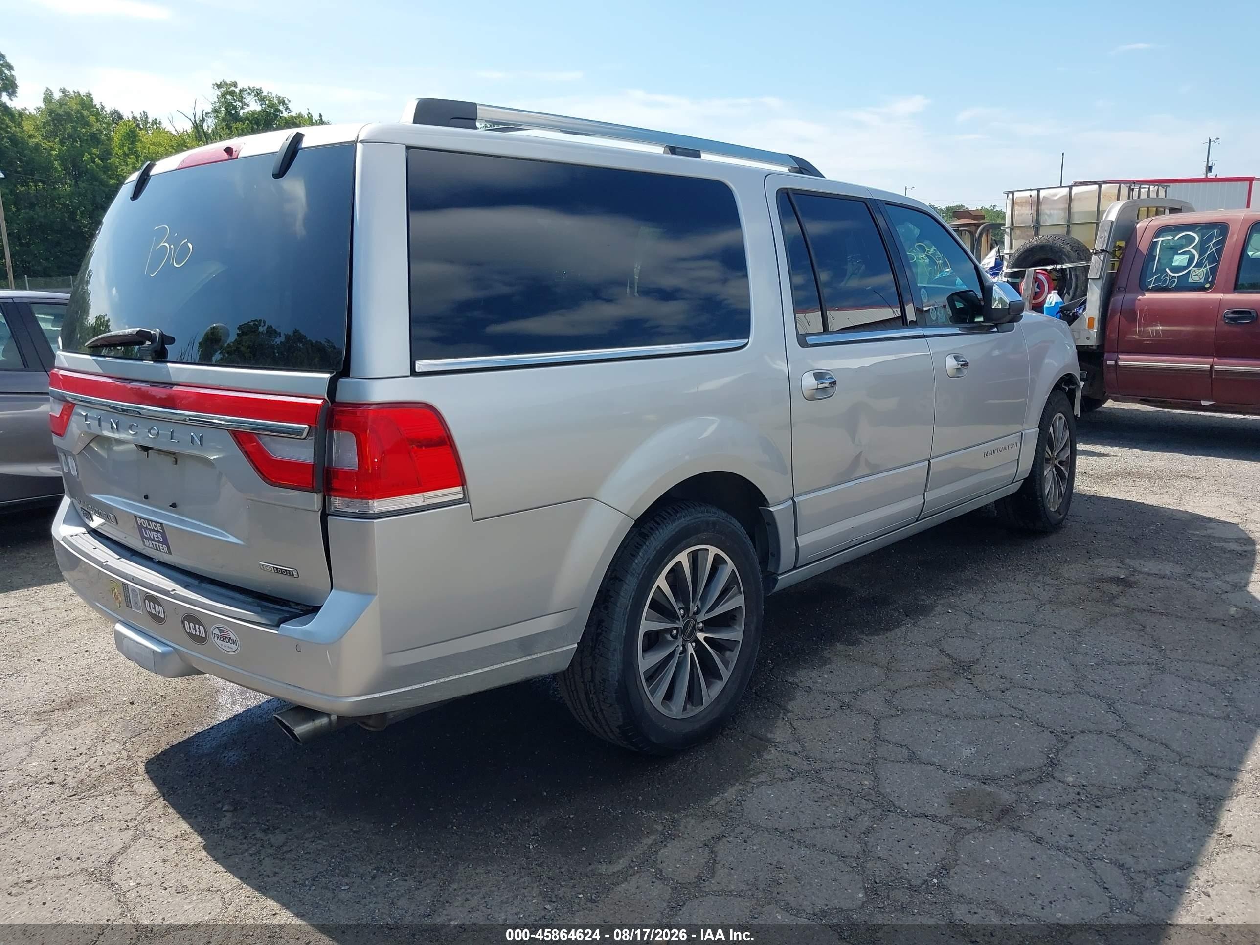 2015 Lincoln Navigator L   Silver vin: 5LMJJ3JT0FEJ10501