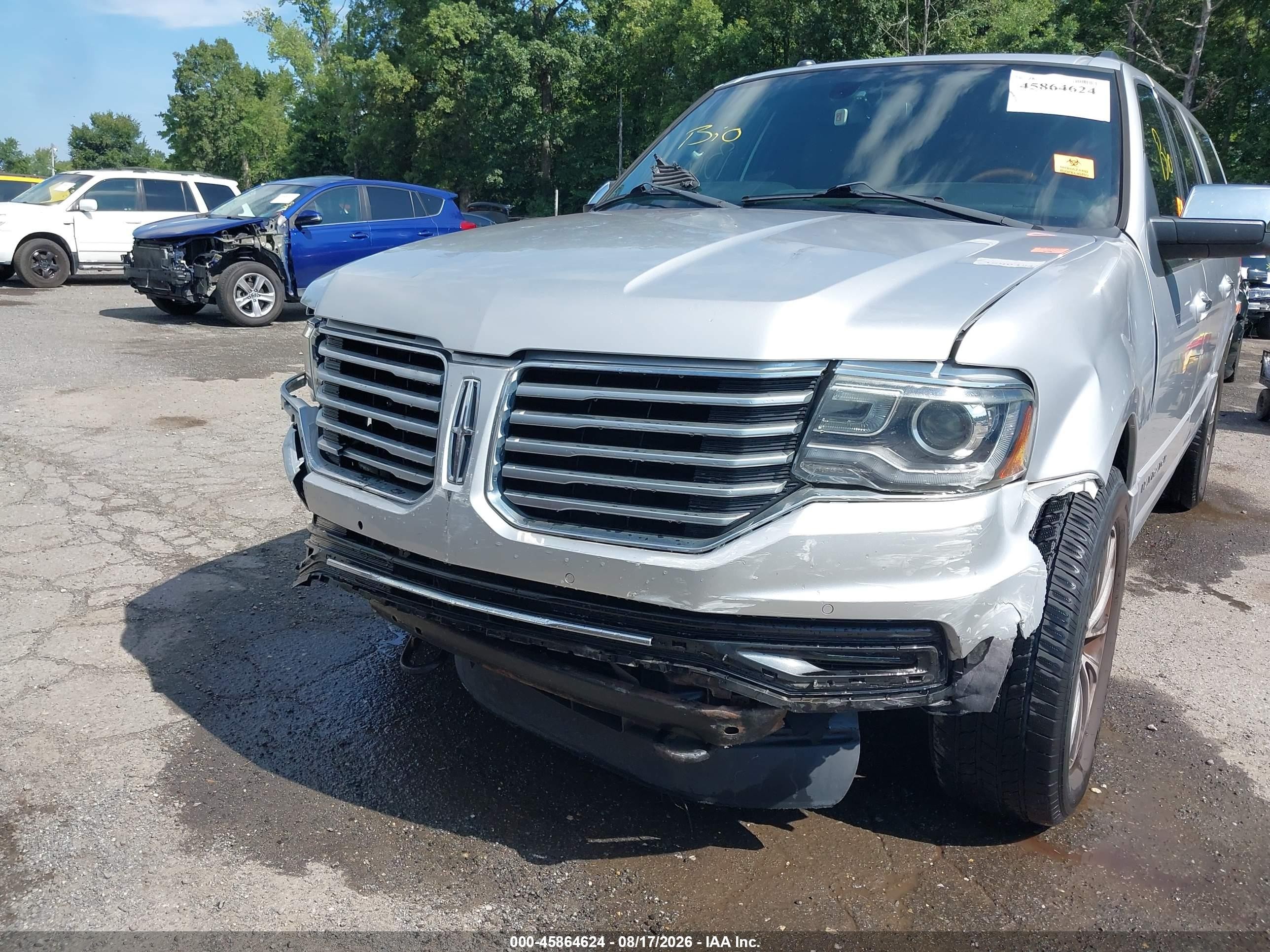 2015 Lincoln Navigator L   Silver vin: 5LMJJ3JT0FEJ10501
