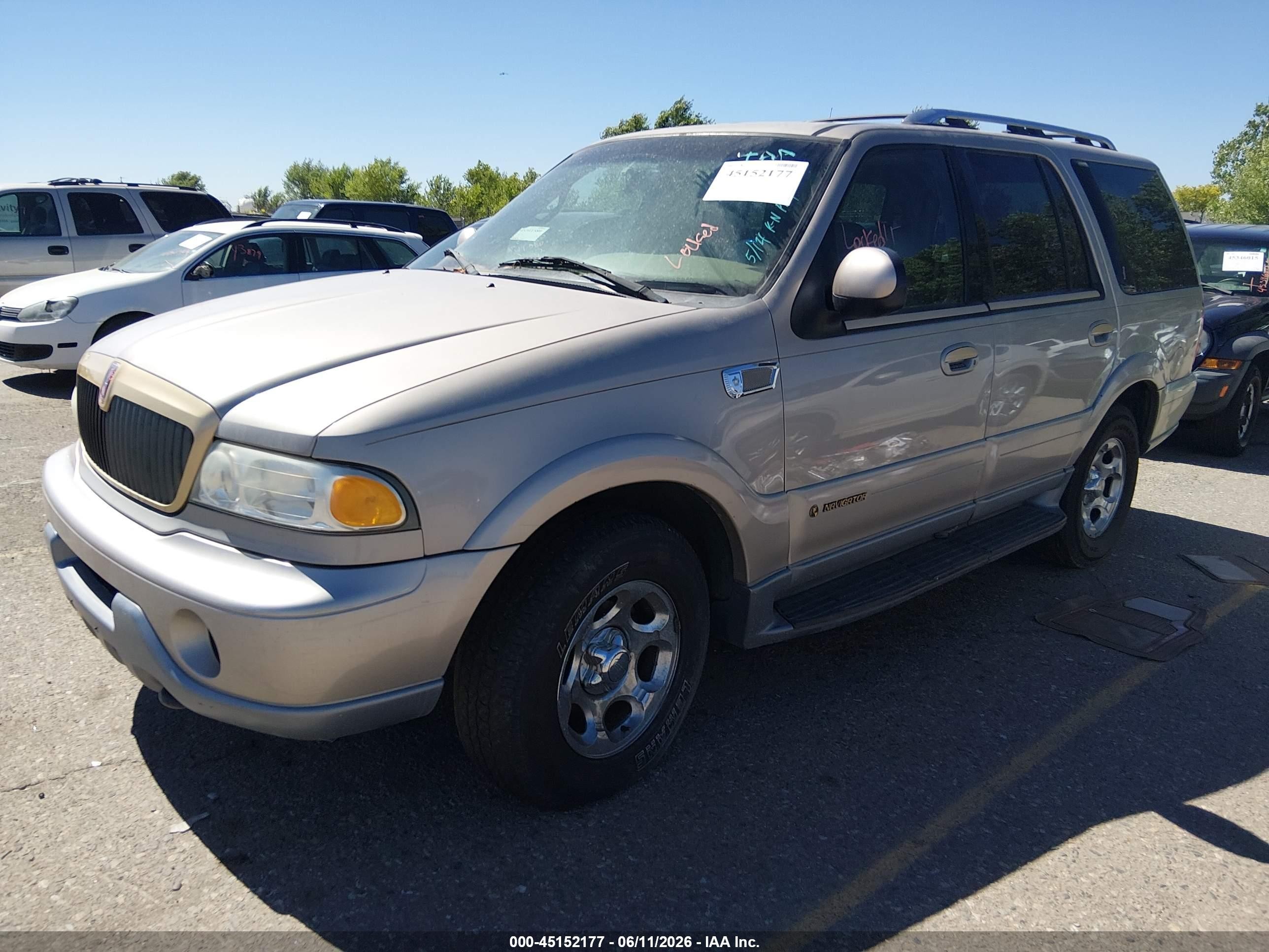 2000 Lincoln Navigator   Gold vin: 5LMPU28A5YLJ11271