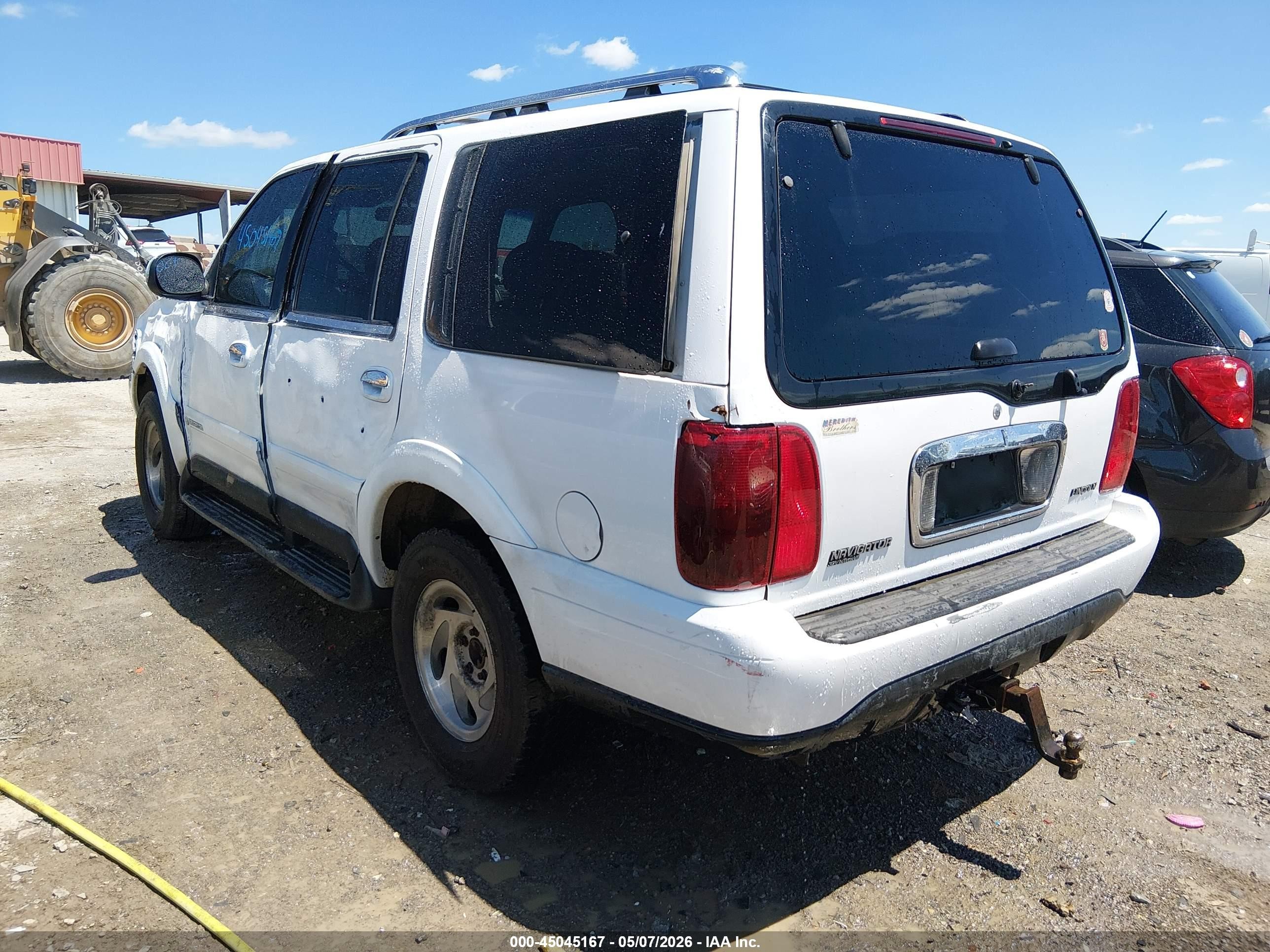 1999 Lincoln Navigator   White vin: 5LMPU28A7XLJ35389