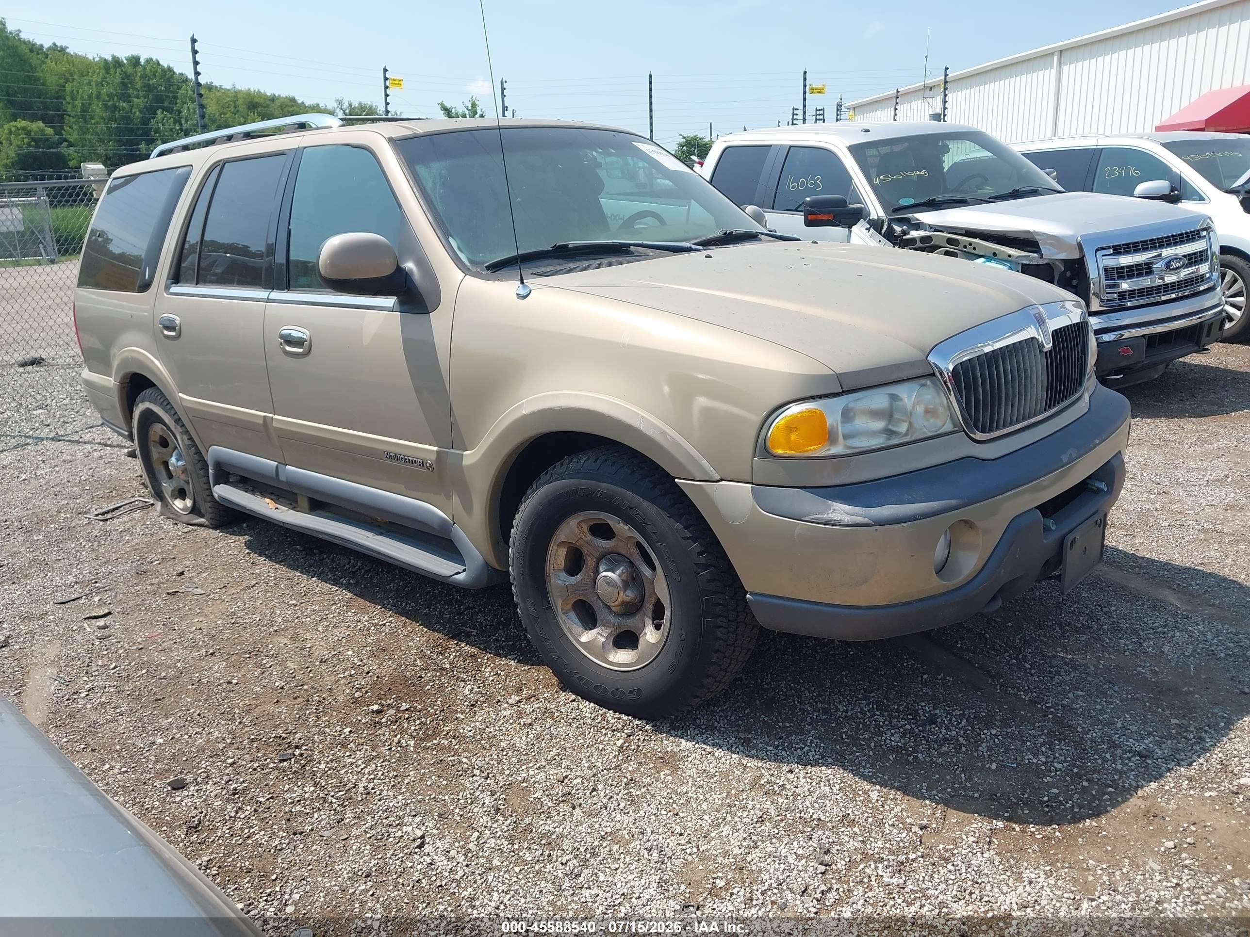 1998 Lincoln Navigator   Золотой vin: 5LMPU28L9WLJ33224