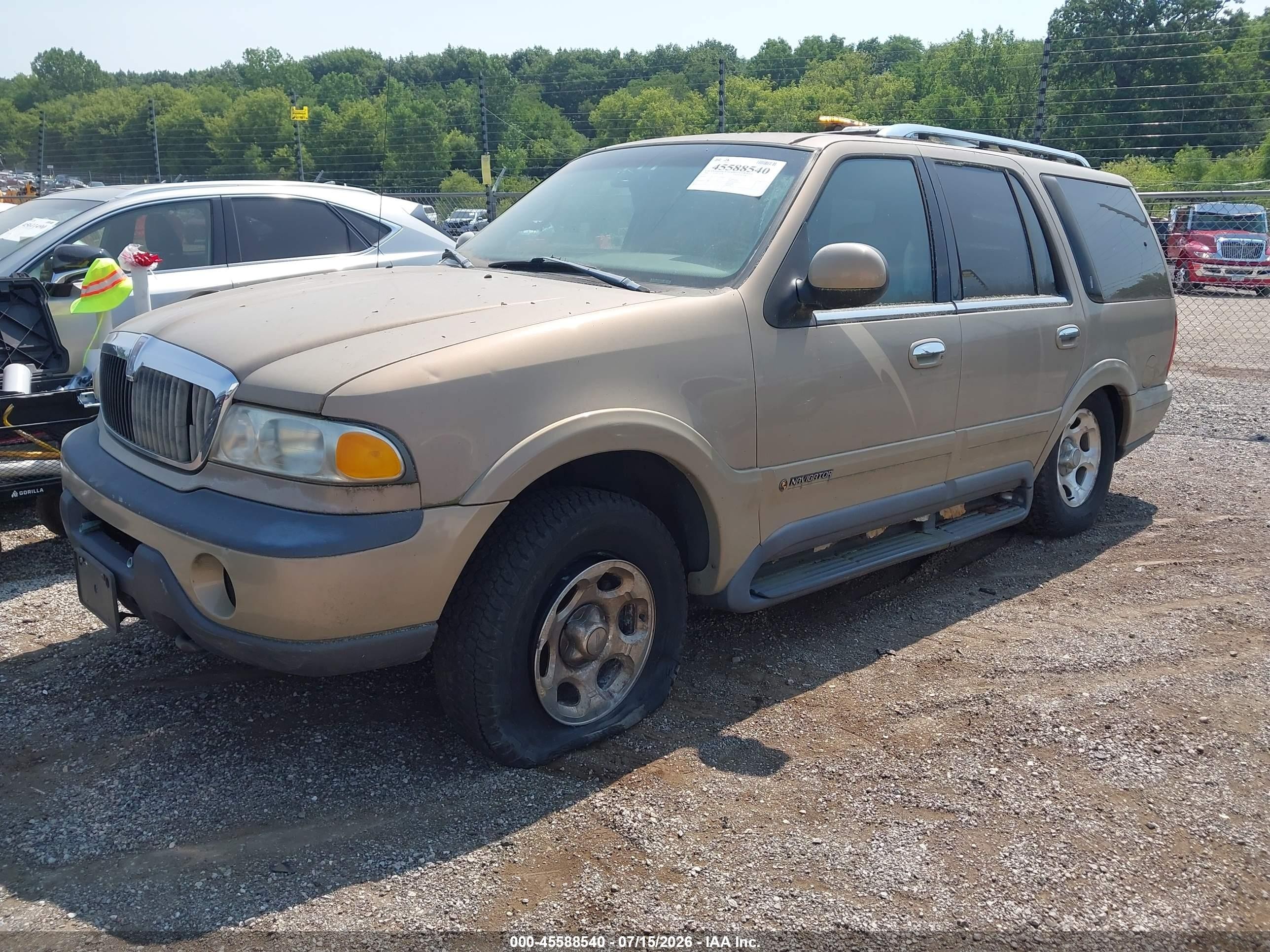 1998 Lincoln Navigator   Gold vin: 5LMPU28L9WLJ33224