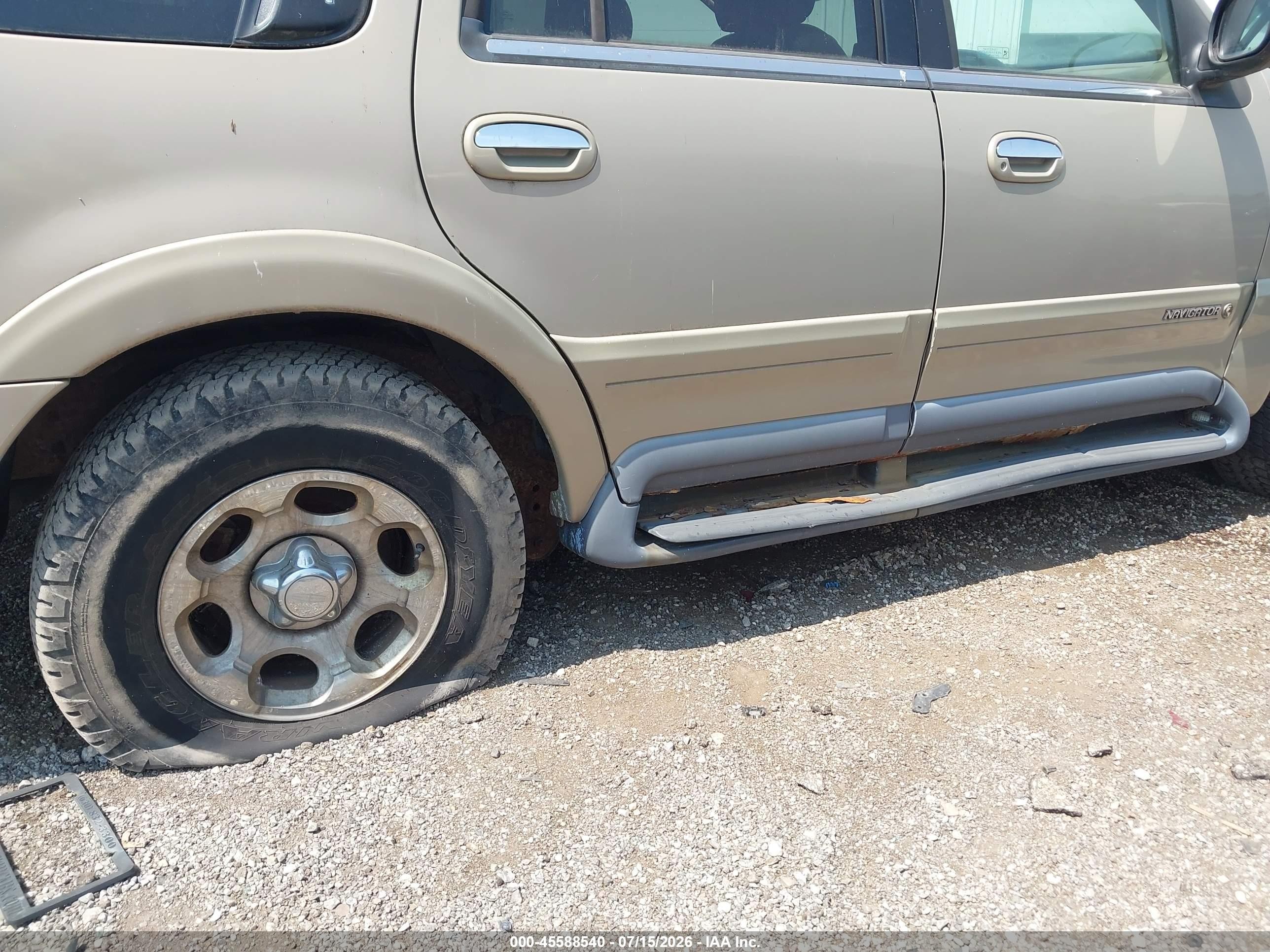 1998 Lincoln Navigator   Gold vin: 5LMPU28L9WLJ33224