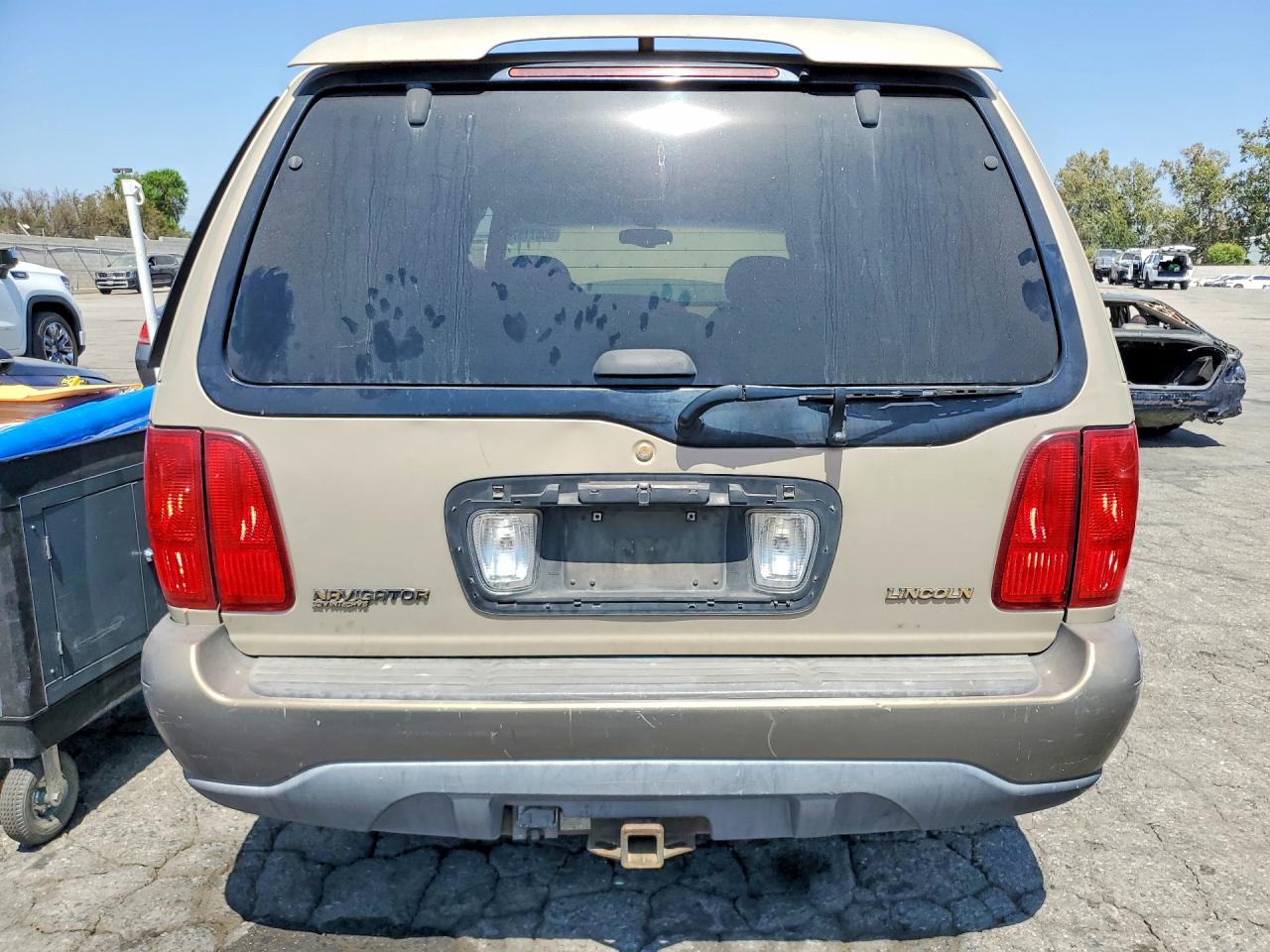 1999 Lincoln Navigator Tan vin: 5LMRU27A2XLJ39098