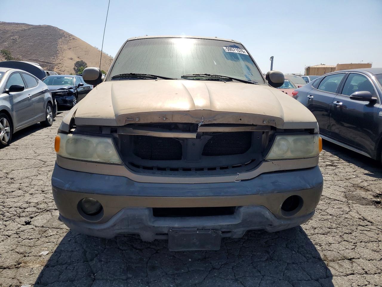 1999 Lincoln Navigator Tan vin: 5LMRU27A2XLJ39098