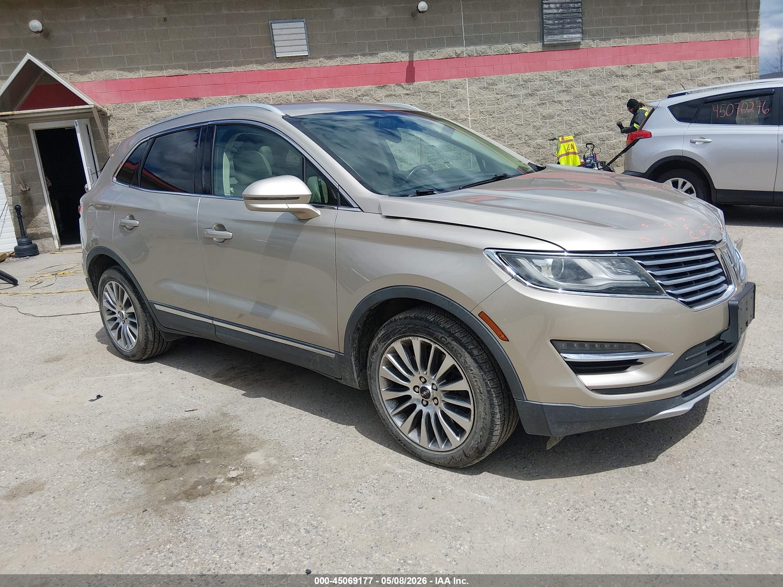 2015 Lincoln Mkc   Tan vin: 5LMTJ2AH1FUJ14903