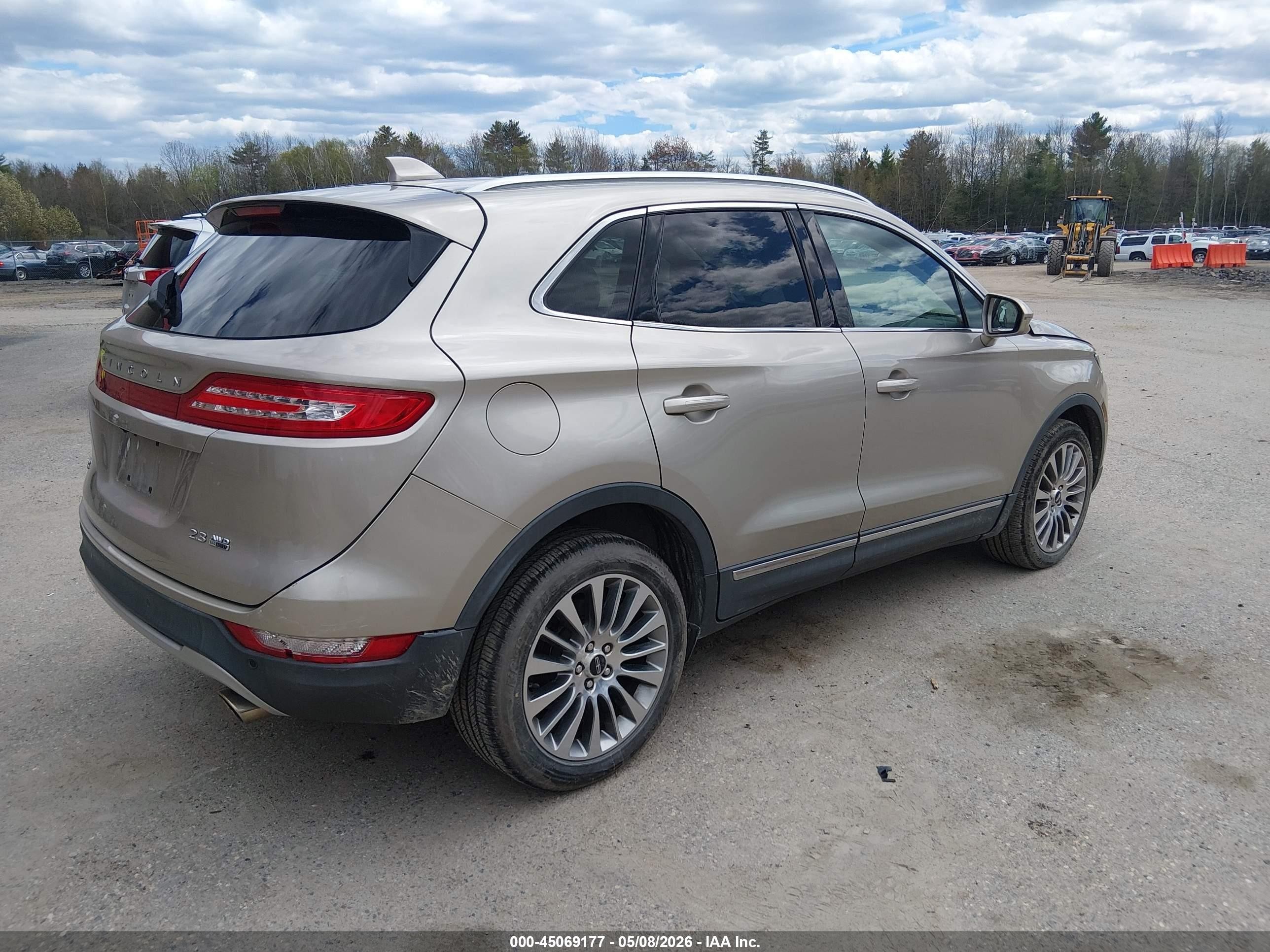 2015 Lincoln Mkc   Tan vin: 5LMTJ2AH1FUJ14903