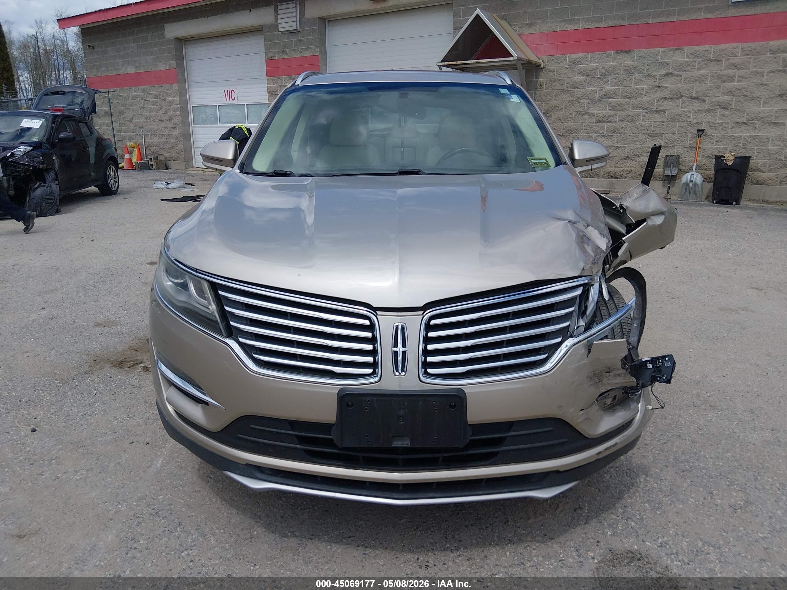 2015 Lincoln Mkc   Tan vin: 5LMTJ2AH1FUJ14903