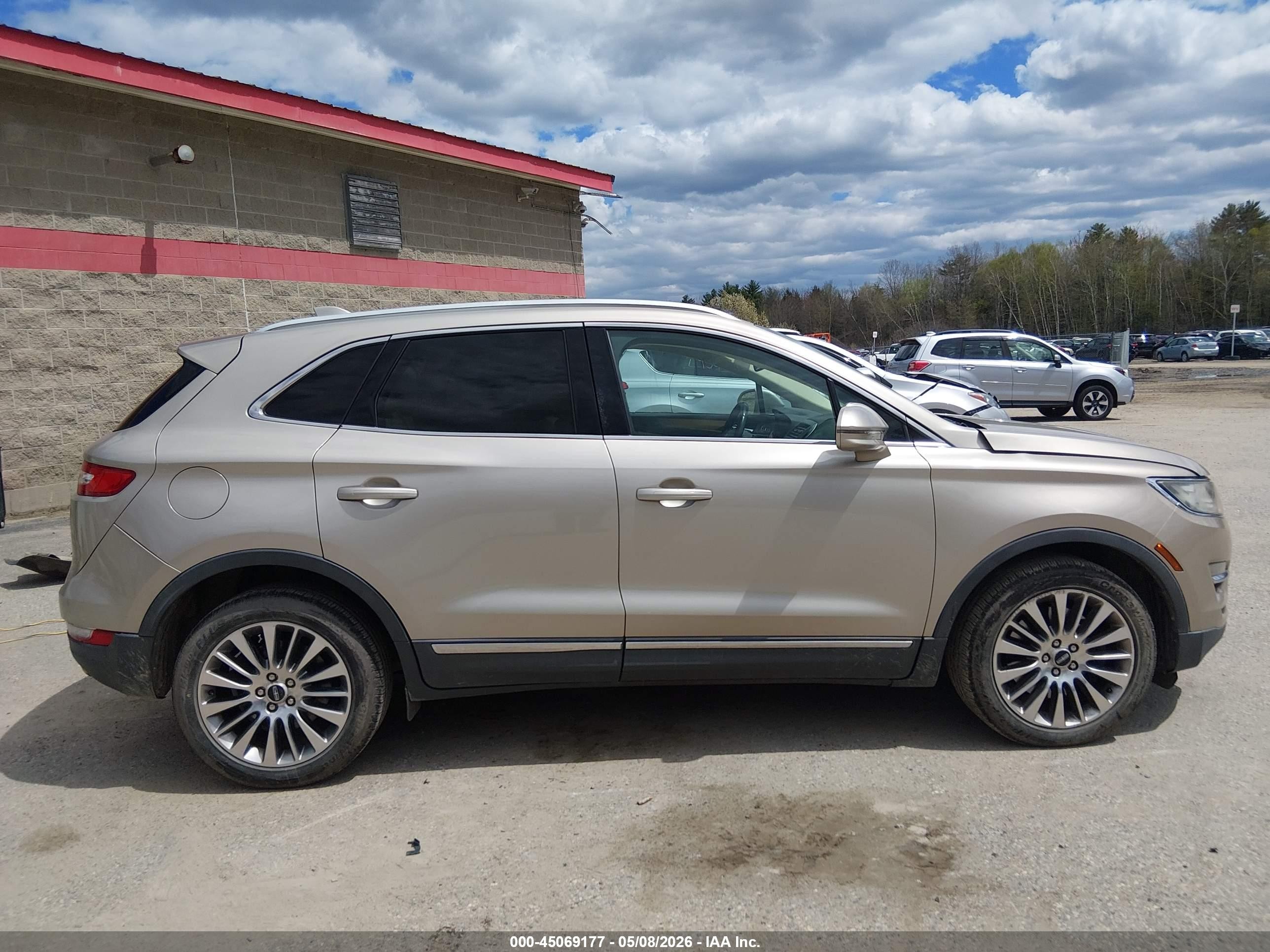 2015 Lincoln Mkc   Tan vin: 5LMTJ2AH1FUJ14903