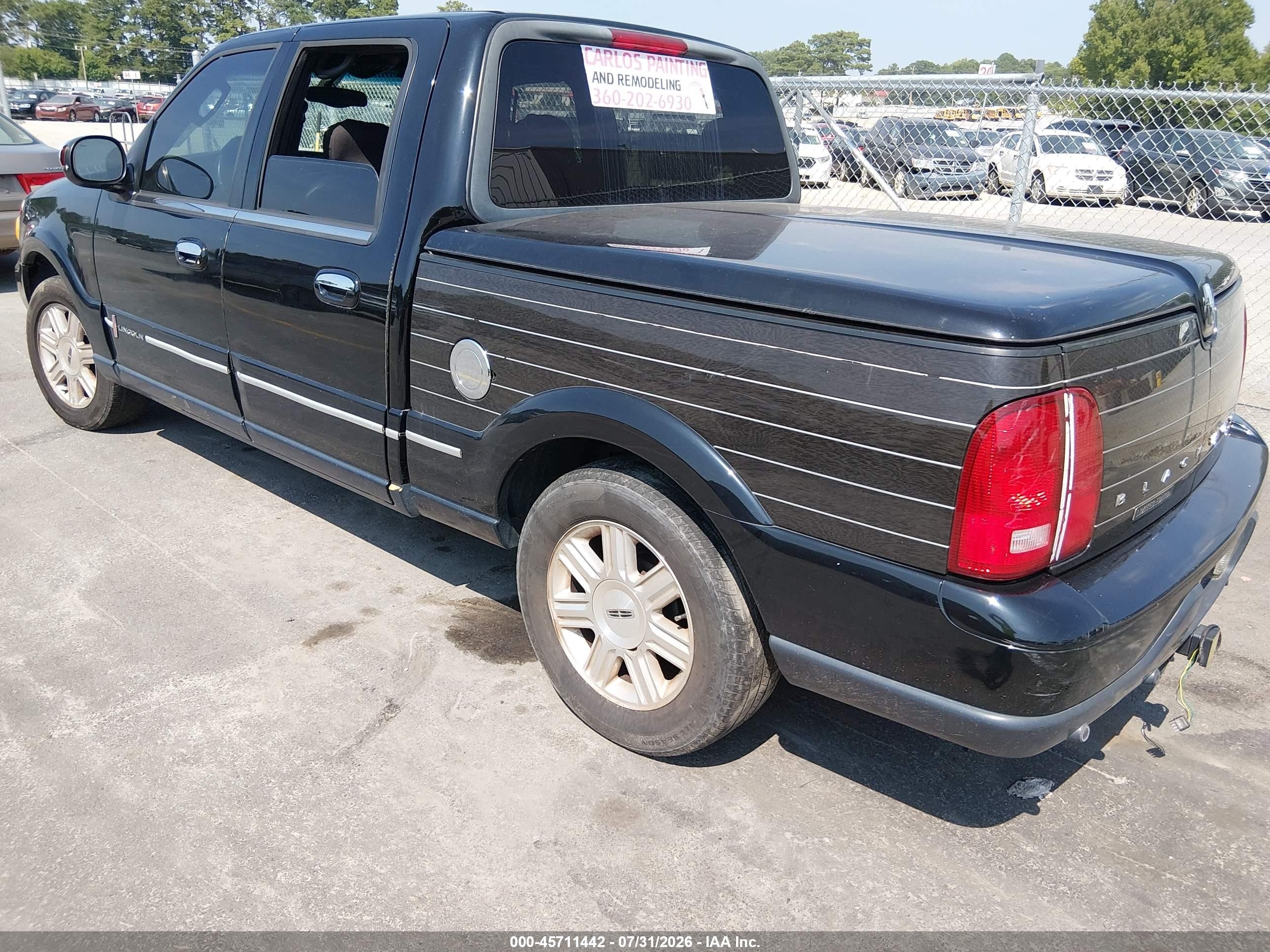 2002 Lincoln Blackwood   Black vin: 5LTEW05A92KJ03413