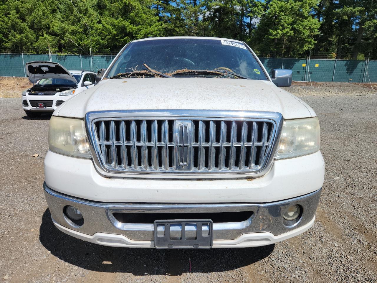 2007 Lincoln Mark Lt White vin: 5LTPW16557FJ01772 Damage: Left Head Lamp, Faded, Repair Required