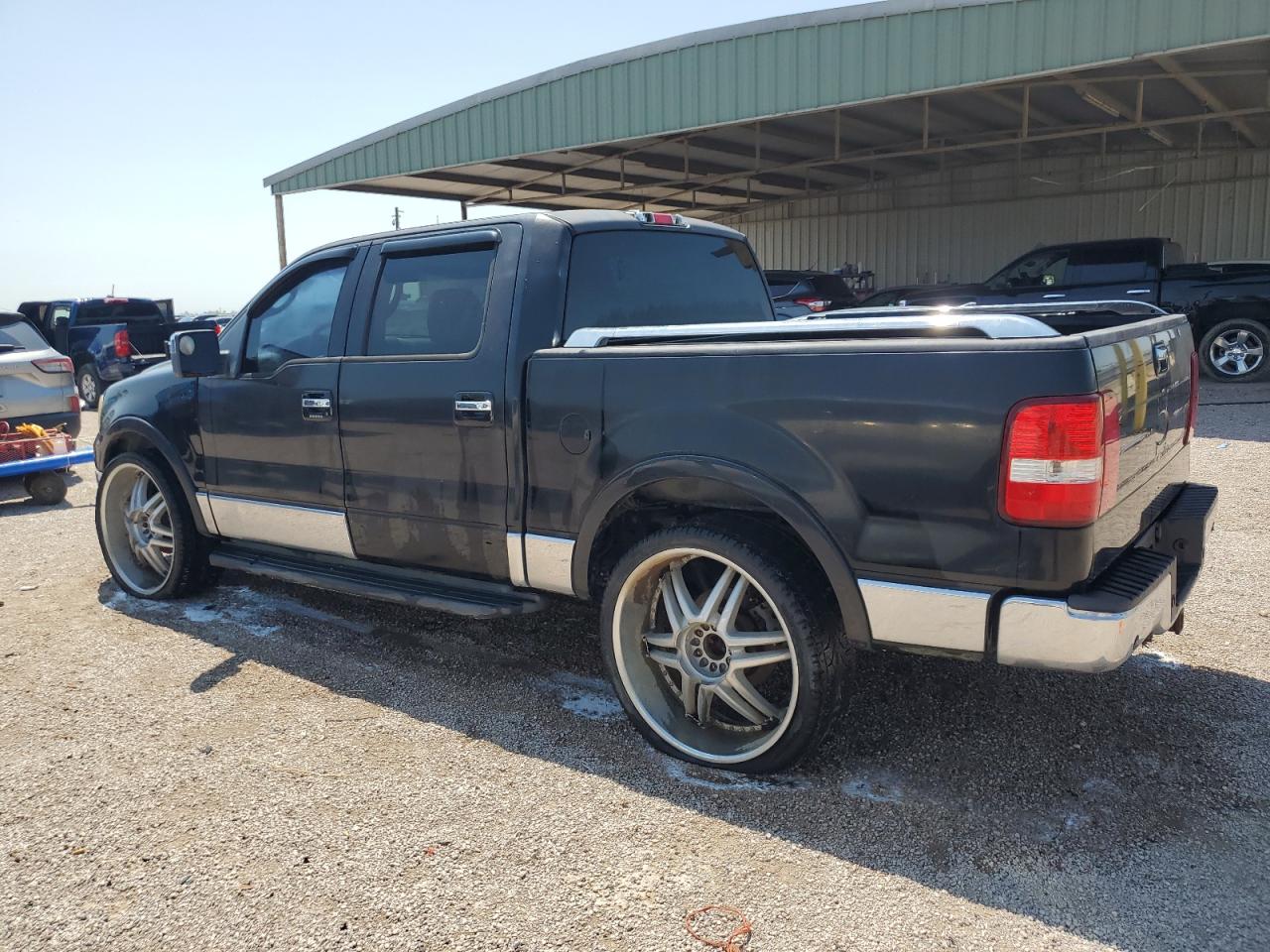 2006 Lincoln Mark Lt Black vin: 5LTPW16566FJ04145 Damage: Left Front Tire, Worn, Replacement Required