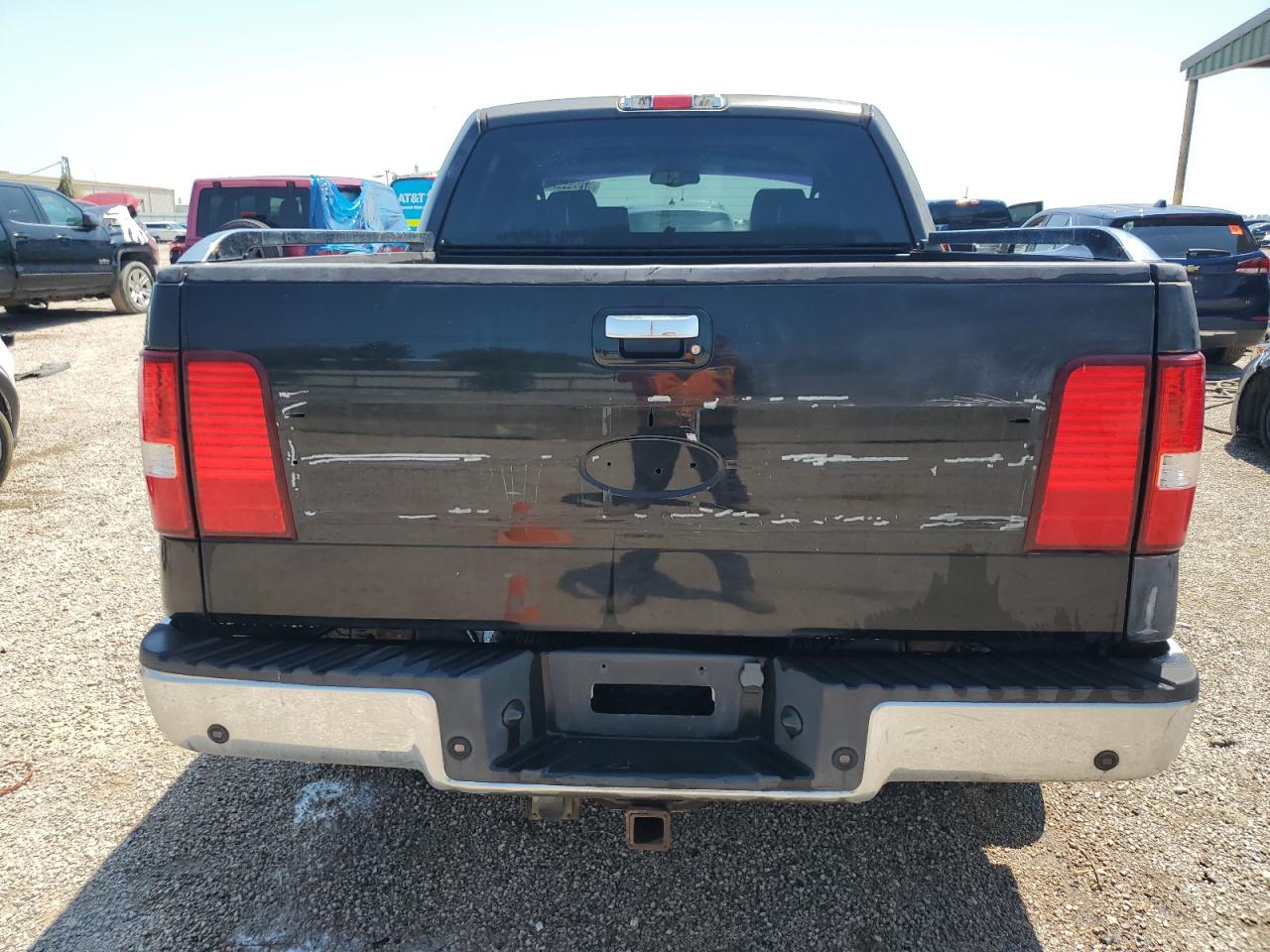 2006 Lincoln Mark Lt Black vin: 5LTPW16566FJ04145 Damage: Lift Gate, Dent(s) W/ Paint Dmg, 1/2 to 1 inch