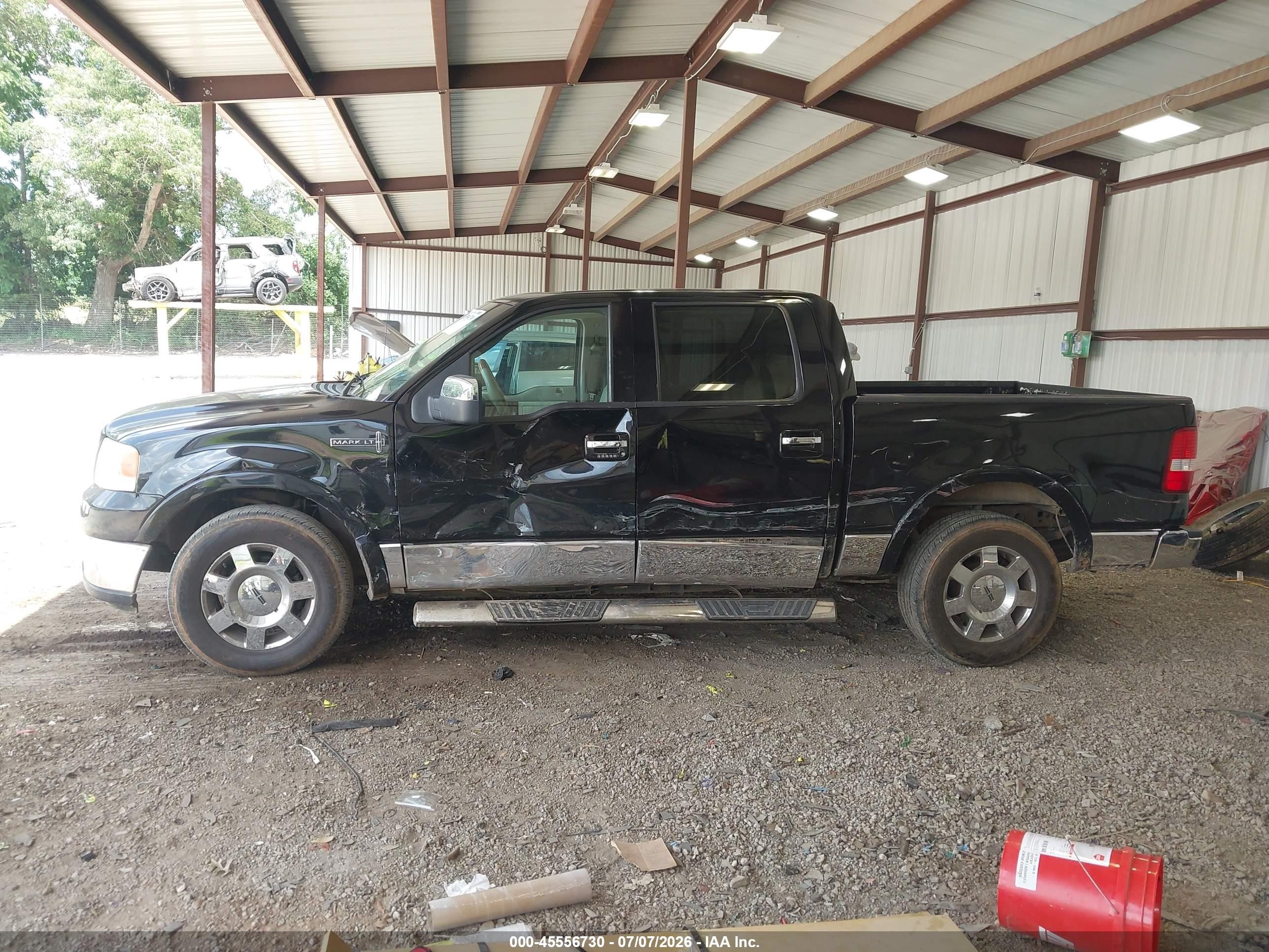 2006 Lincoln Mark Lt   Black vin: 5LTPW16576FJ25456