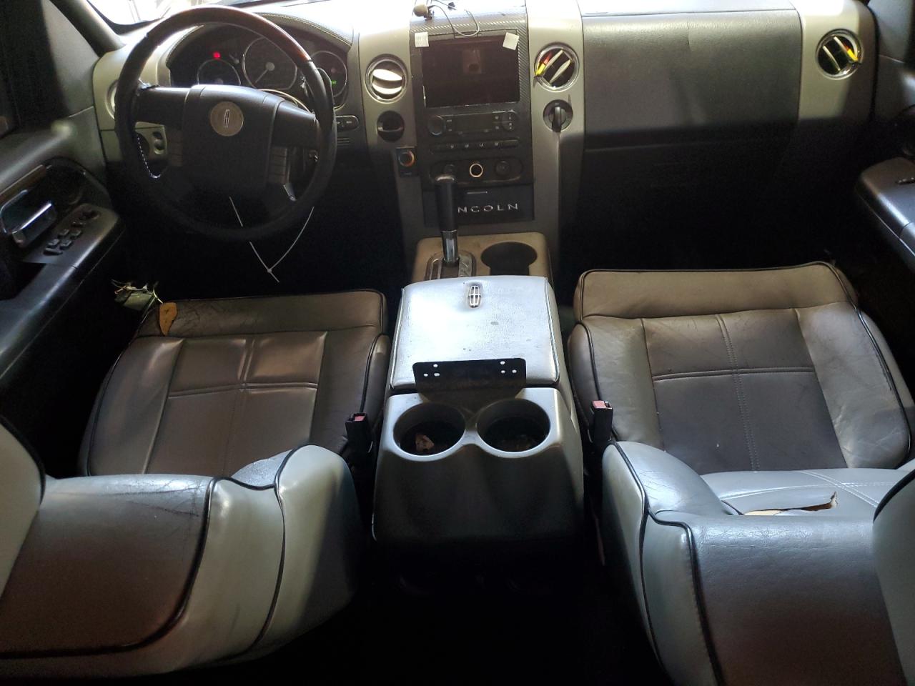 2007 Lincoln Mark Lt Black vin: 5LTPW16597FJ09857 Damage: Dash/Panel, Cracked, Replacement Required
