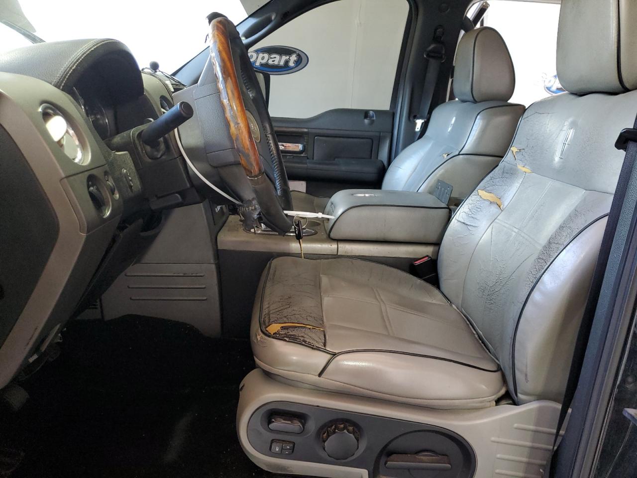 2007 Lincoln Mark Lt Black vin: 5LTPW16597FJ09857 Damage: Steering Wheel, Worn, Replacement Required