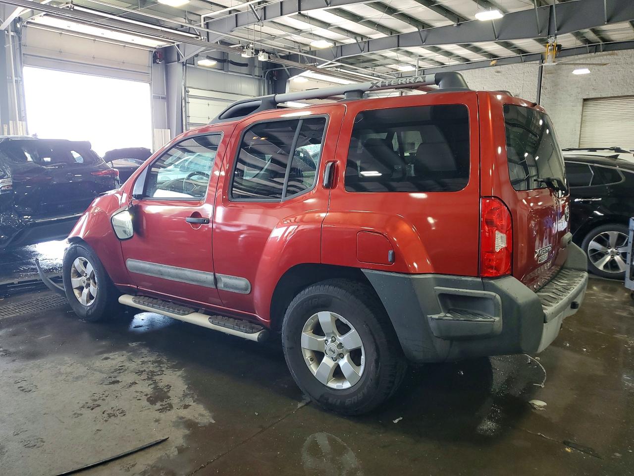 2012 Nissan Xterra X Orange vin: 5N1AN0NU5CC502888