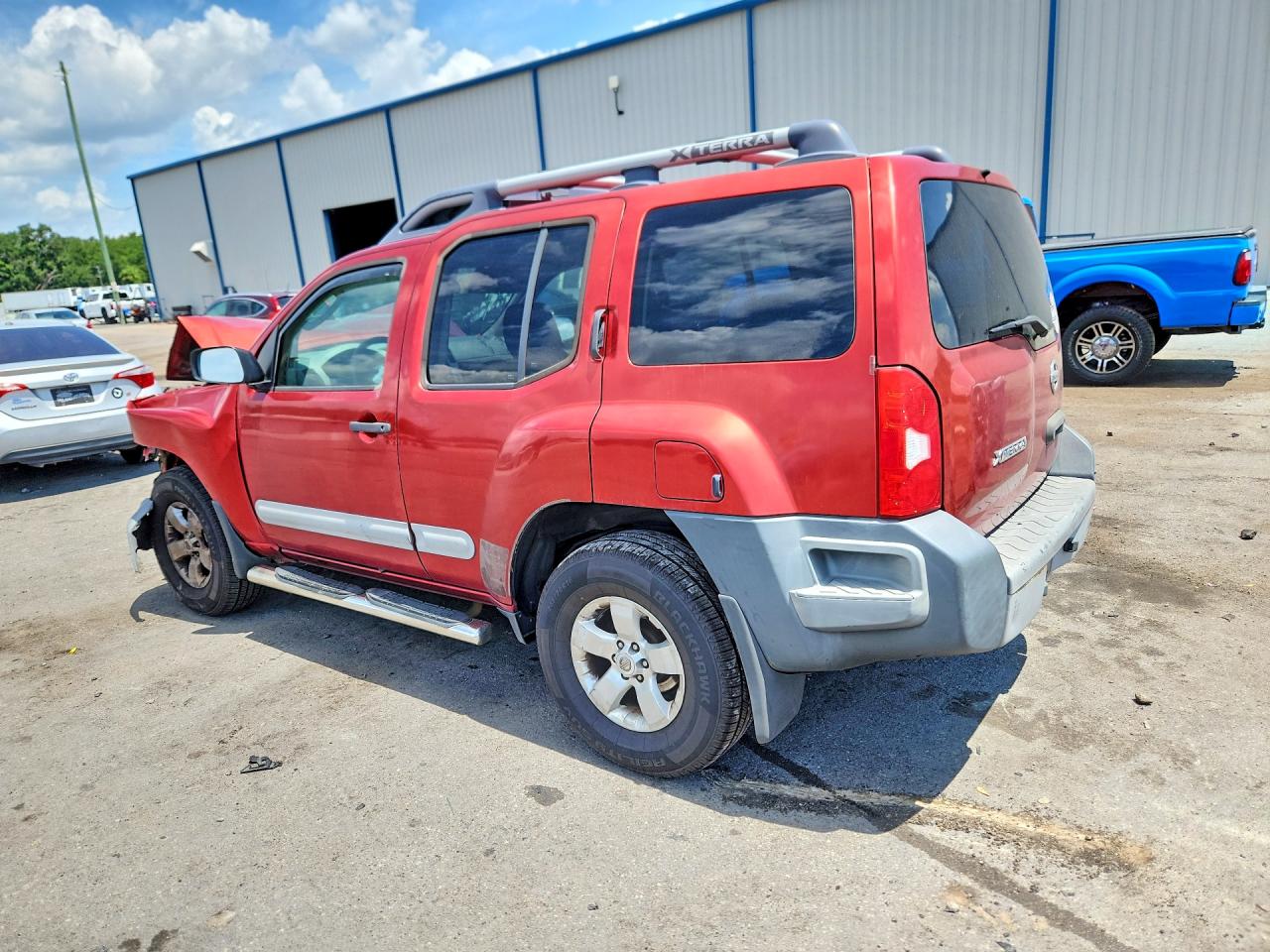 2011 Nissan Xterra X Red vin: 5N1AN0NW2BC506493