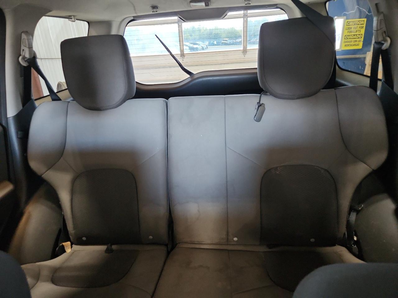 2012 Nissan Xterra X White vin: 5N1AN0NW9CC501924 Damage: Left Rear Seat, Stained, Permanent