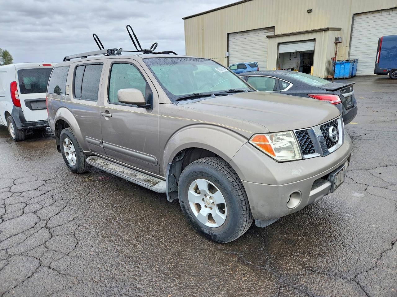 2005 Nissan Pathfinder Xe Tan vin: 5N1AR18WX5C789431