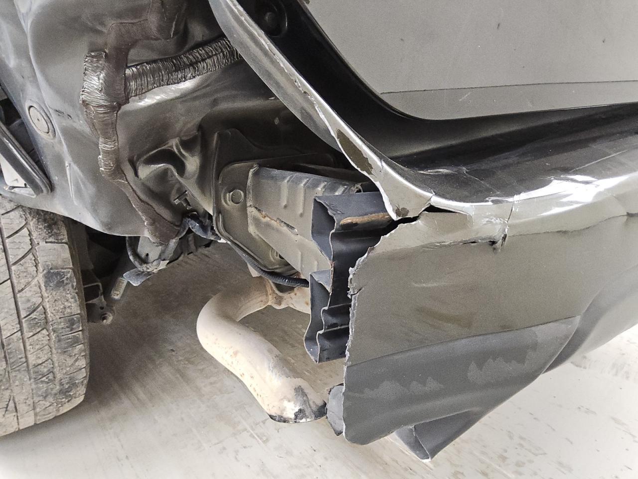 2015 Nissan Rogue S Коричневый vin: 5N1AT2MT1FC847365 Damage: Rear Bumper, Broken, Replacement Required