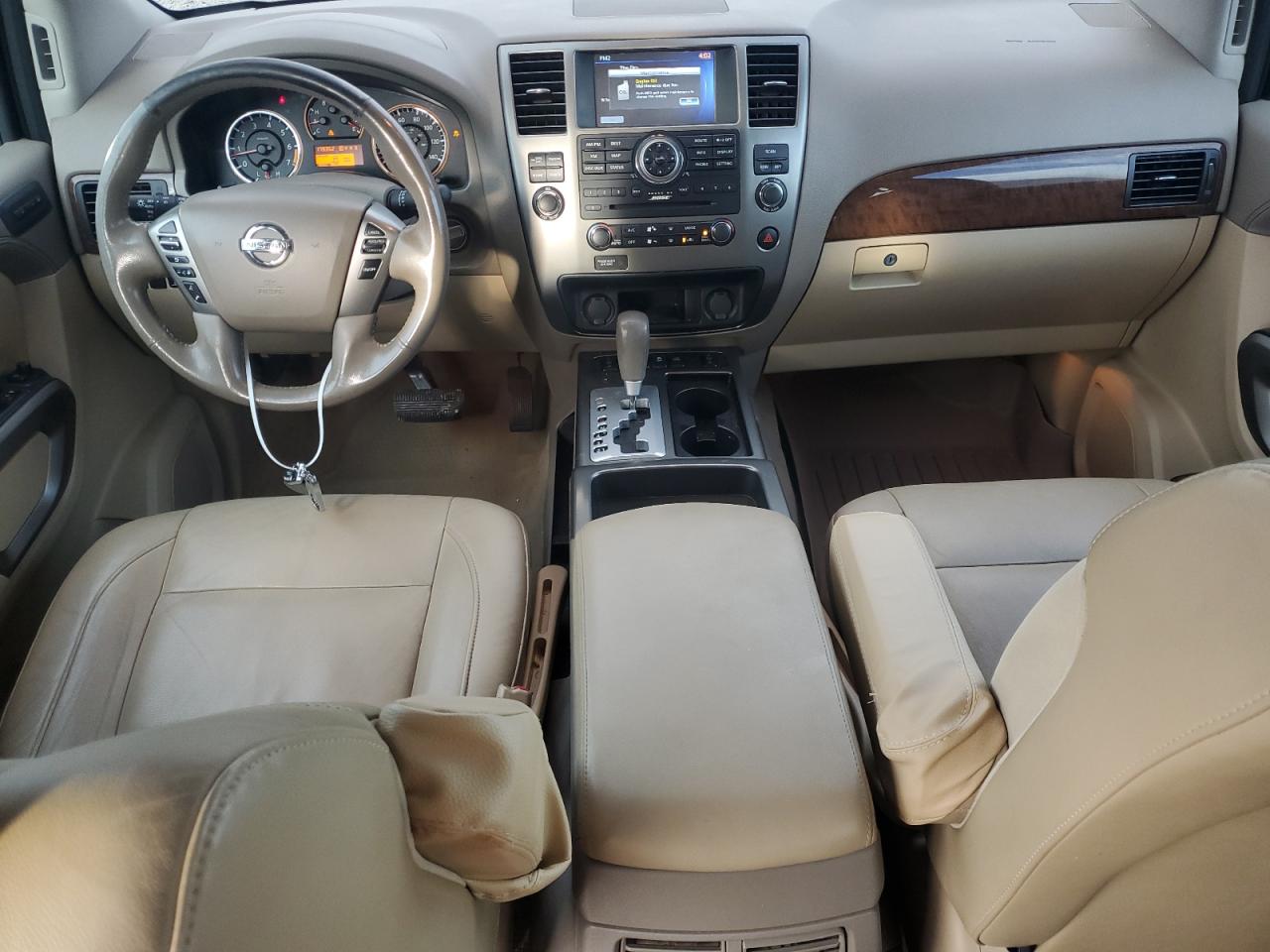 2015 Nissan Armada Platinum Burgundy vin: 5N1BA0ND3FN614002 Damage: Left Front Armrest, Broken, Replacement Required