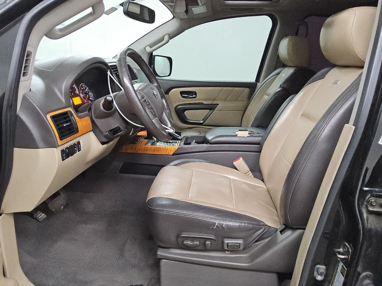 2015 Nissan Armada Platinum Черный vin: 5N1BA0NF2FN609990 Damage: Left Front Seat Cushion, Worn, Replacement Required