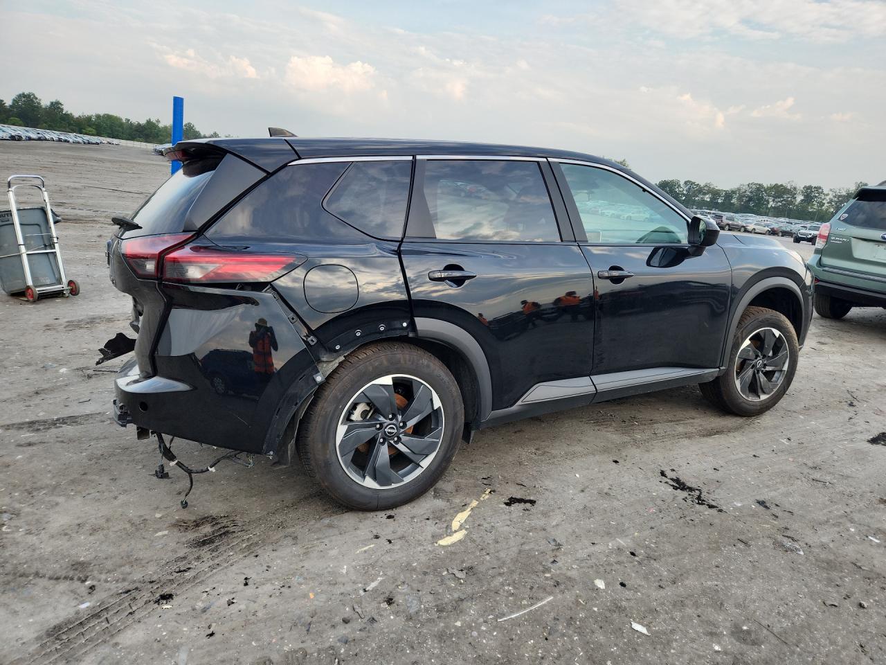 2025 Nissan Rogue Sv Black vin: 5N1BT3BA1SC795581 Damage: Right Rear Wheel Opening Mldg, Broken, Replacement Required