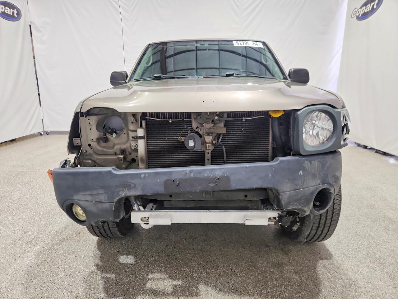 2004 Nissan Xterra Xe Tan vin: 5N1ED28T94C685314