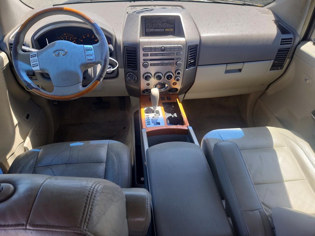 2004 Infiniti Qx56 Base Tan vin: 5N3AA08C14N812290