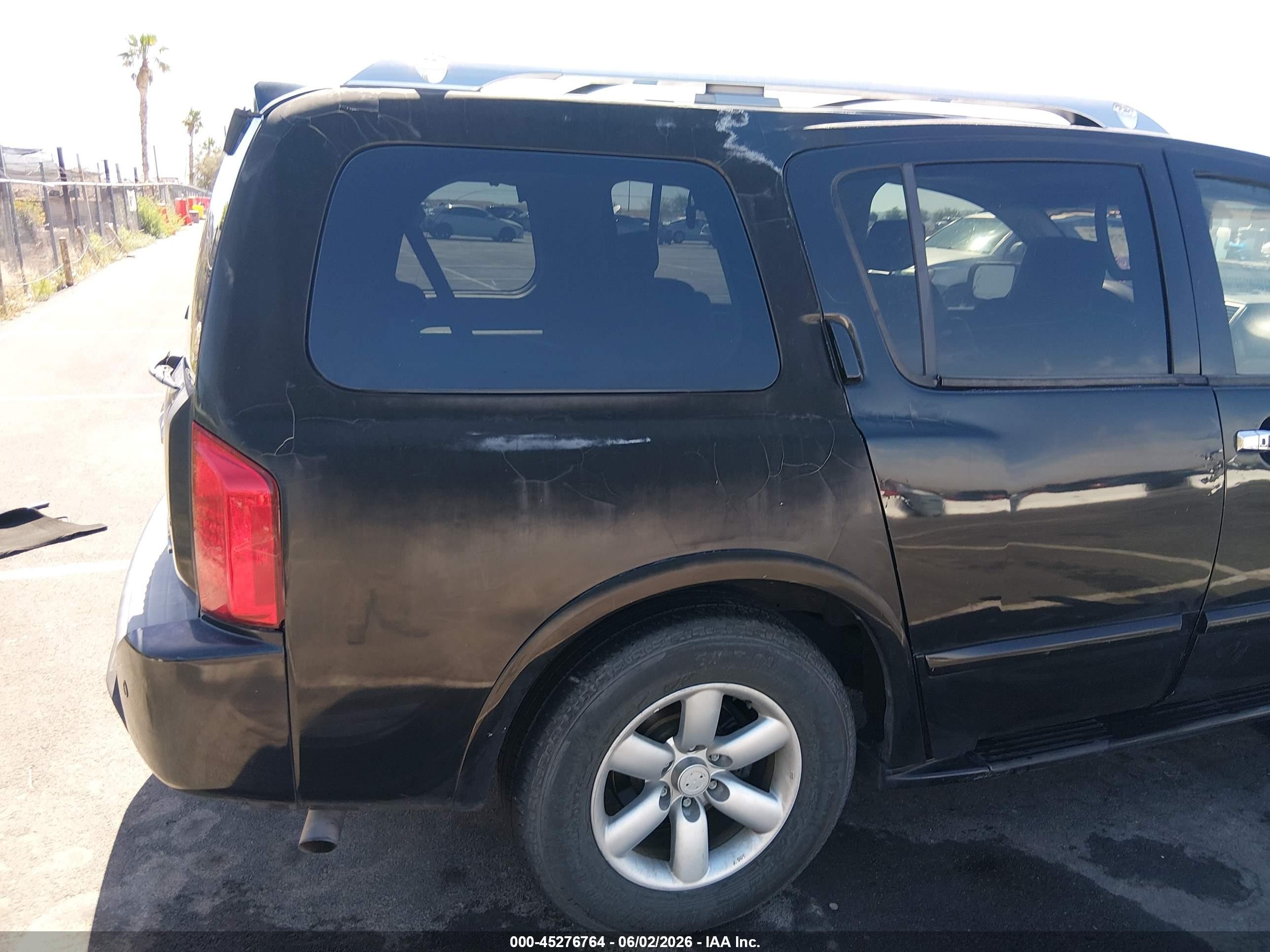 2009 Infiniti Qx56   Black vin: 5N3AA08D59N904003
