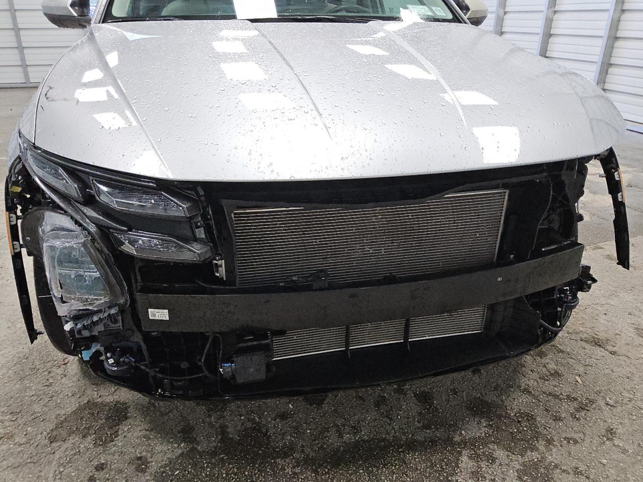 2025 Hyundai Tucson Sel Silver vin: 5NMJBCDE5SH553655 Damage: Front Bumper, Missing, Replacement Required