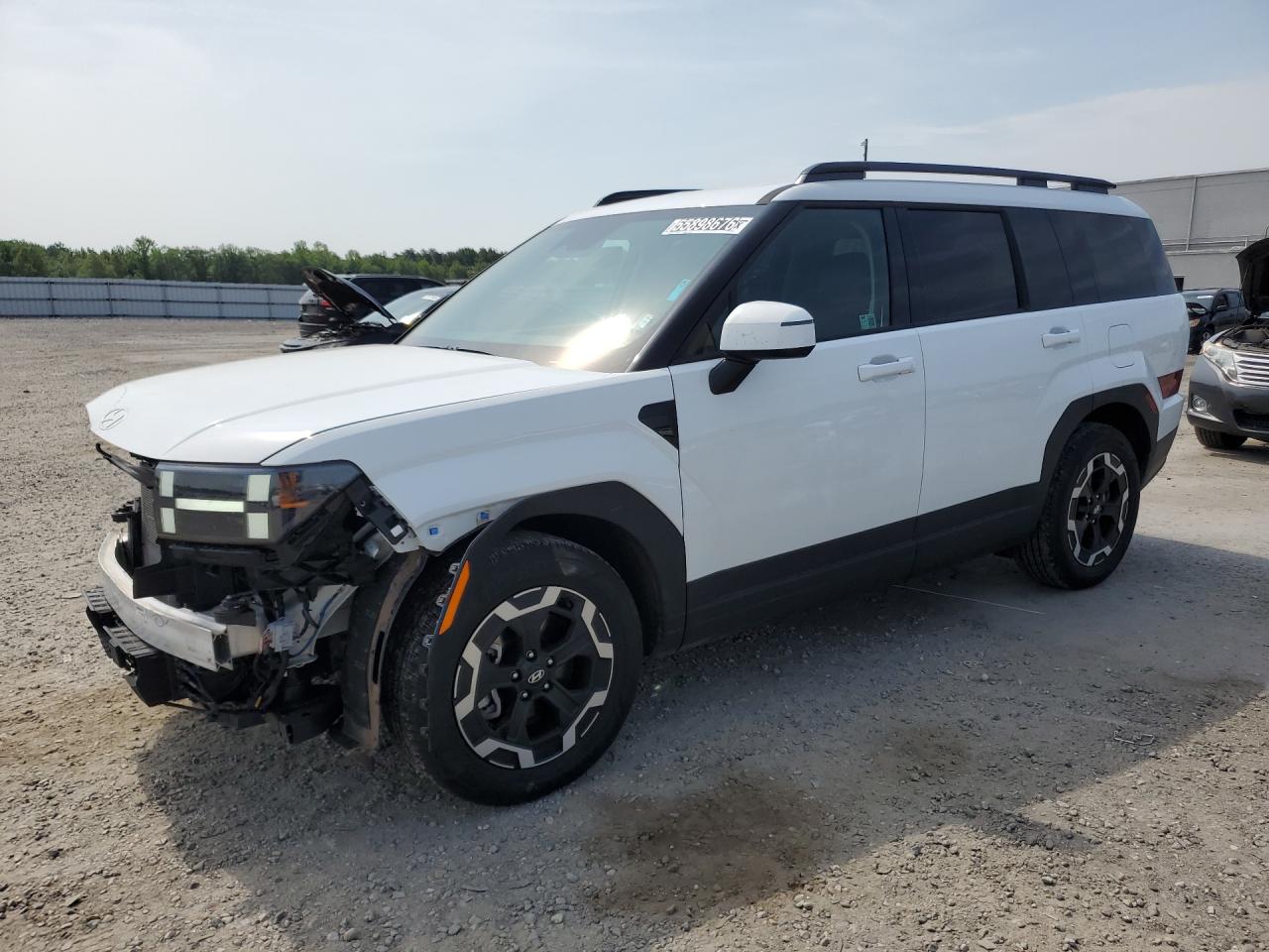 2026 Hyundai Santa Fe Sel White vin: 5NMP2DGL9TH182513 Damage: Left Front Wheel Opening Mldg, Broken, Replacement Required