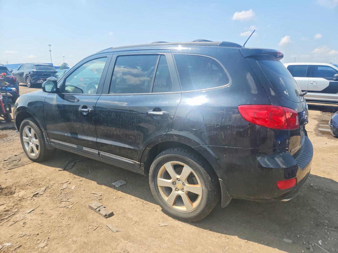 2009 Hyundai Santa Fe Limited Черный vin: 5NMSH13E49H287838