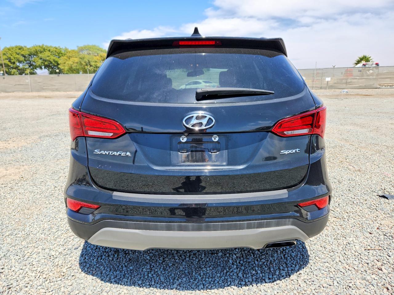 2018 Hyundai Santa Fe Sport 2.4l Черный vin: 5NMZU3LB0JH068116