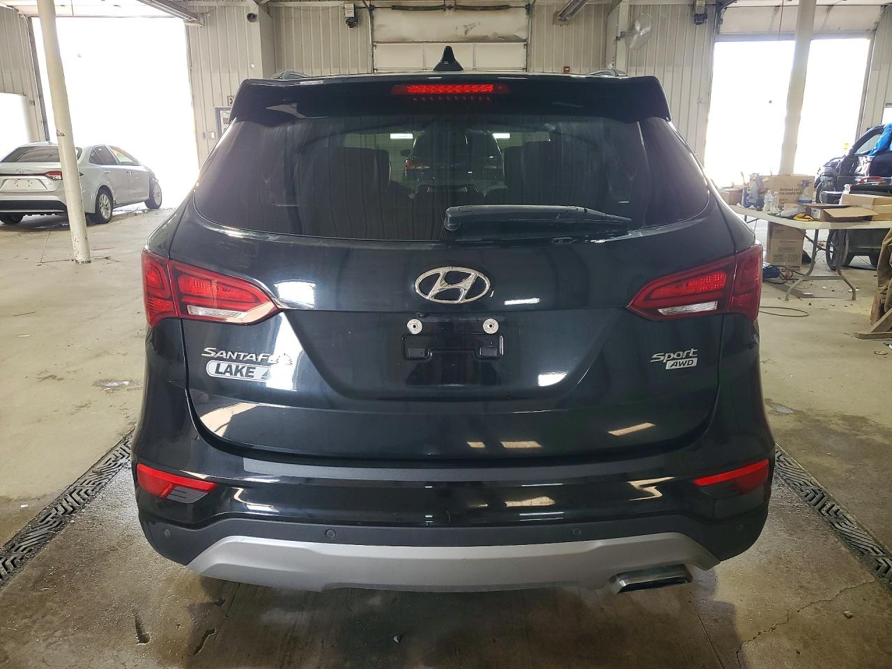 2018 Hyundai Santa Fe Sport 2.4l Черный vin: 5NMZUDLB7JH079121