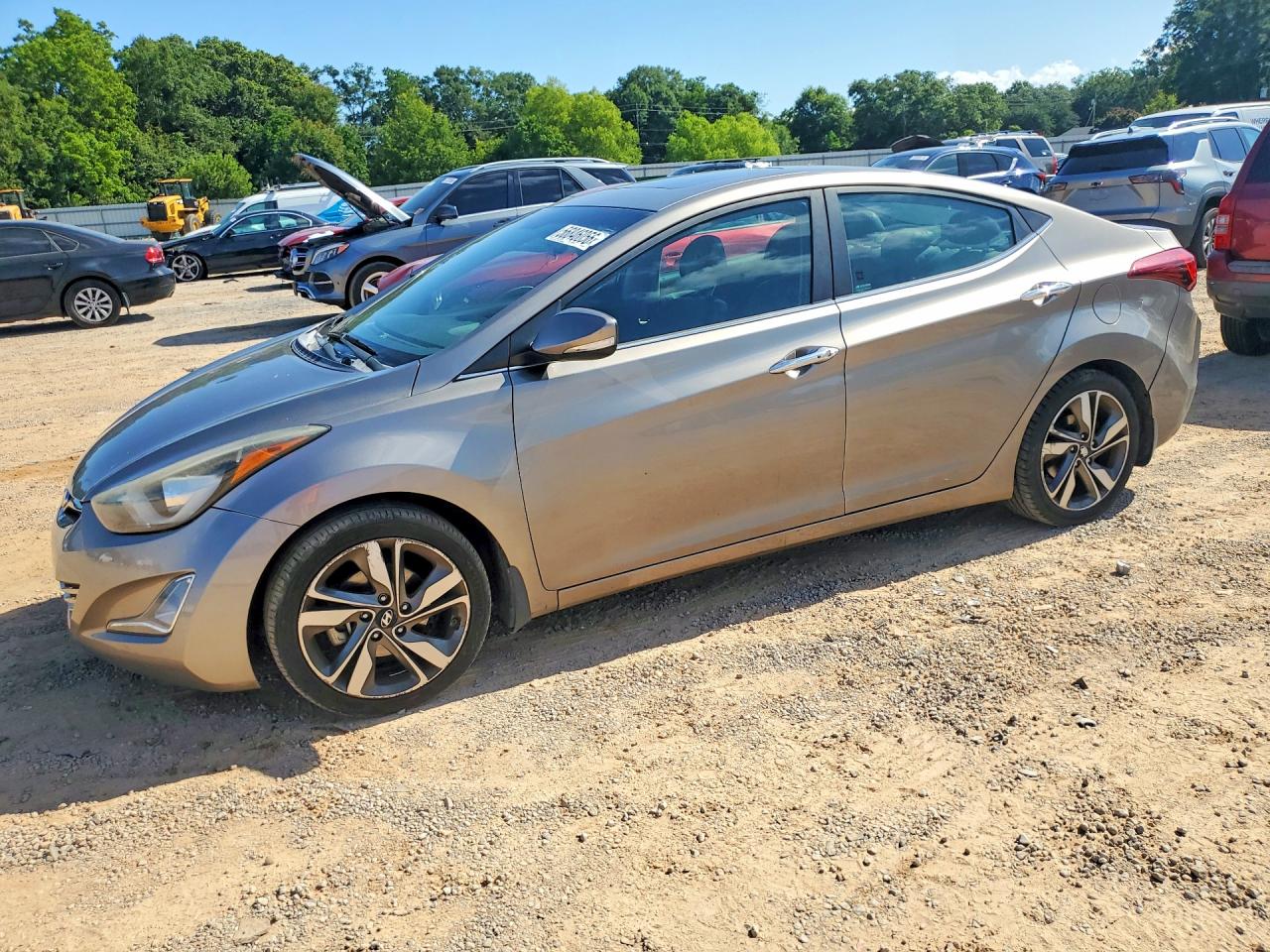 2015 Hyundai Elantra Limited Золотой vin: 5NPDH4AE1FH563243