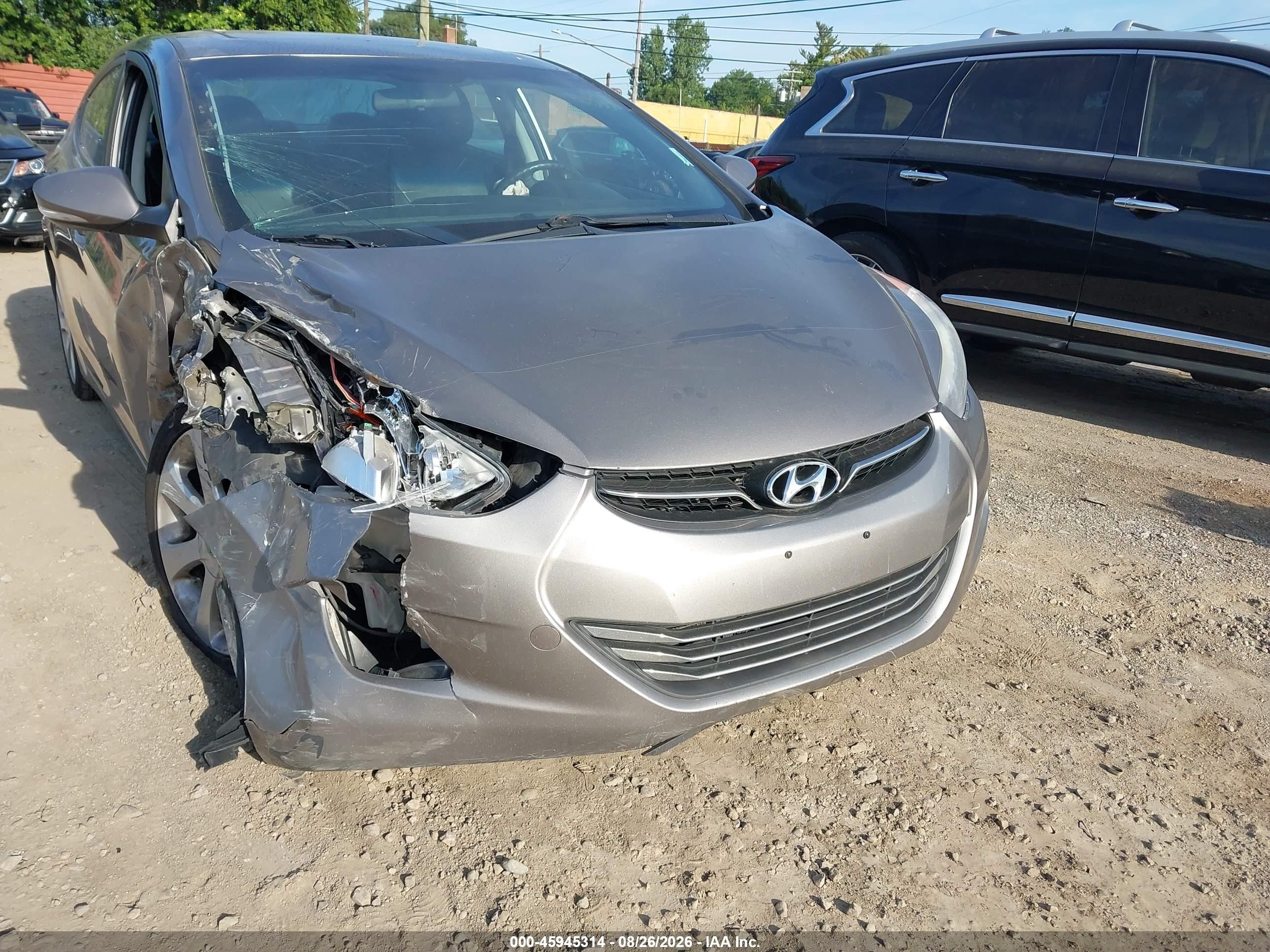 2012 Hyundai Elantra Limited Beige vin: 5NPDH4AE2CH120000