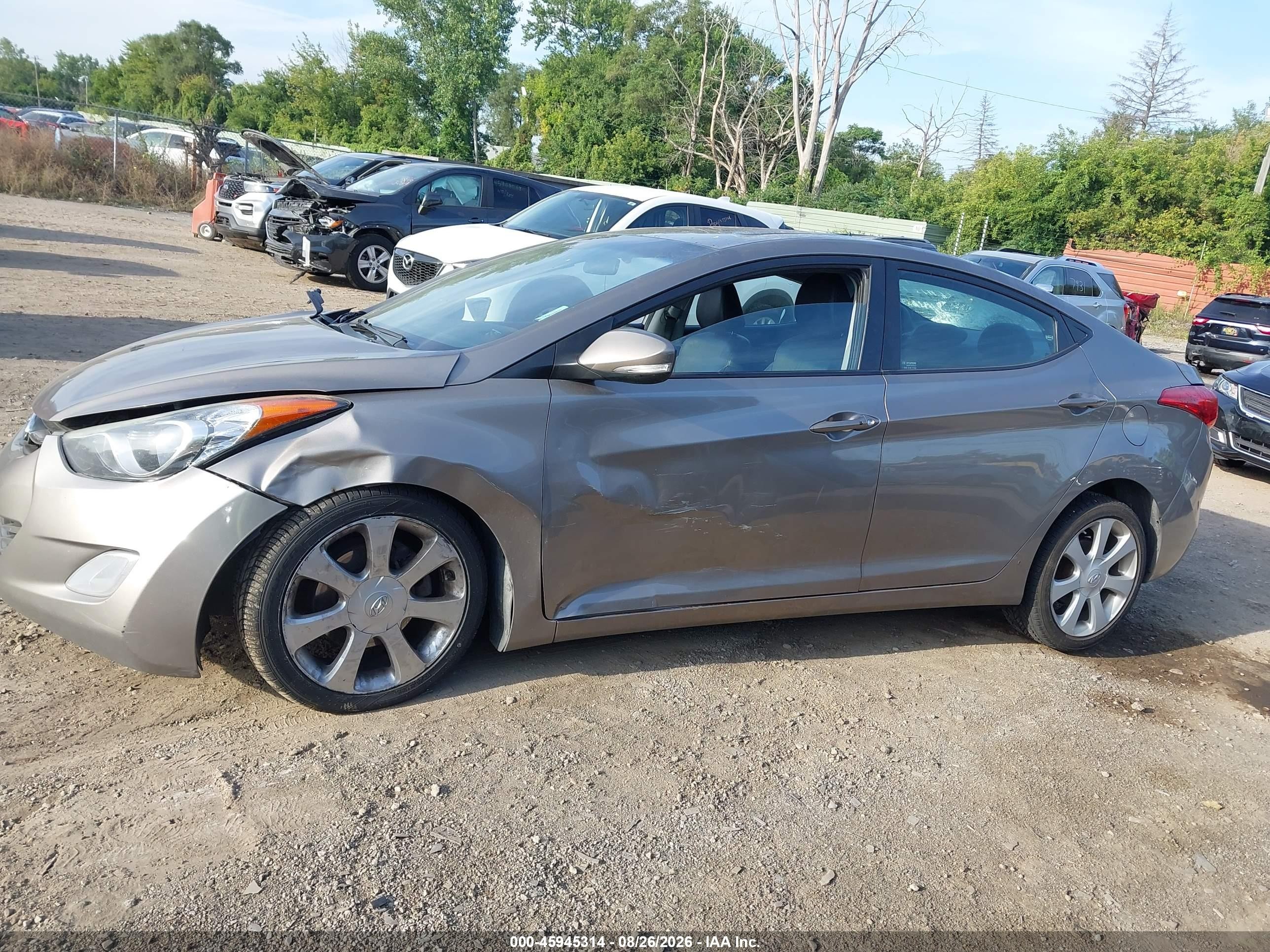 2012 Hyundai Elantra Limited Beige vin: 5NPDH4AE2CH120000
