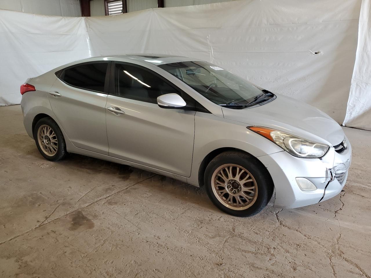 2012 Hyundai Elantra Limited Silver vin: 5NPDH4AE5CH092662 Damage: Right Rocker Panel, Dent(S) W/ Paint Dmg, 9 To 10 Inches