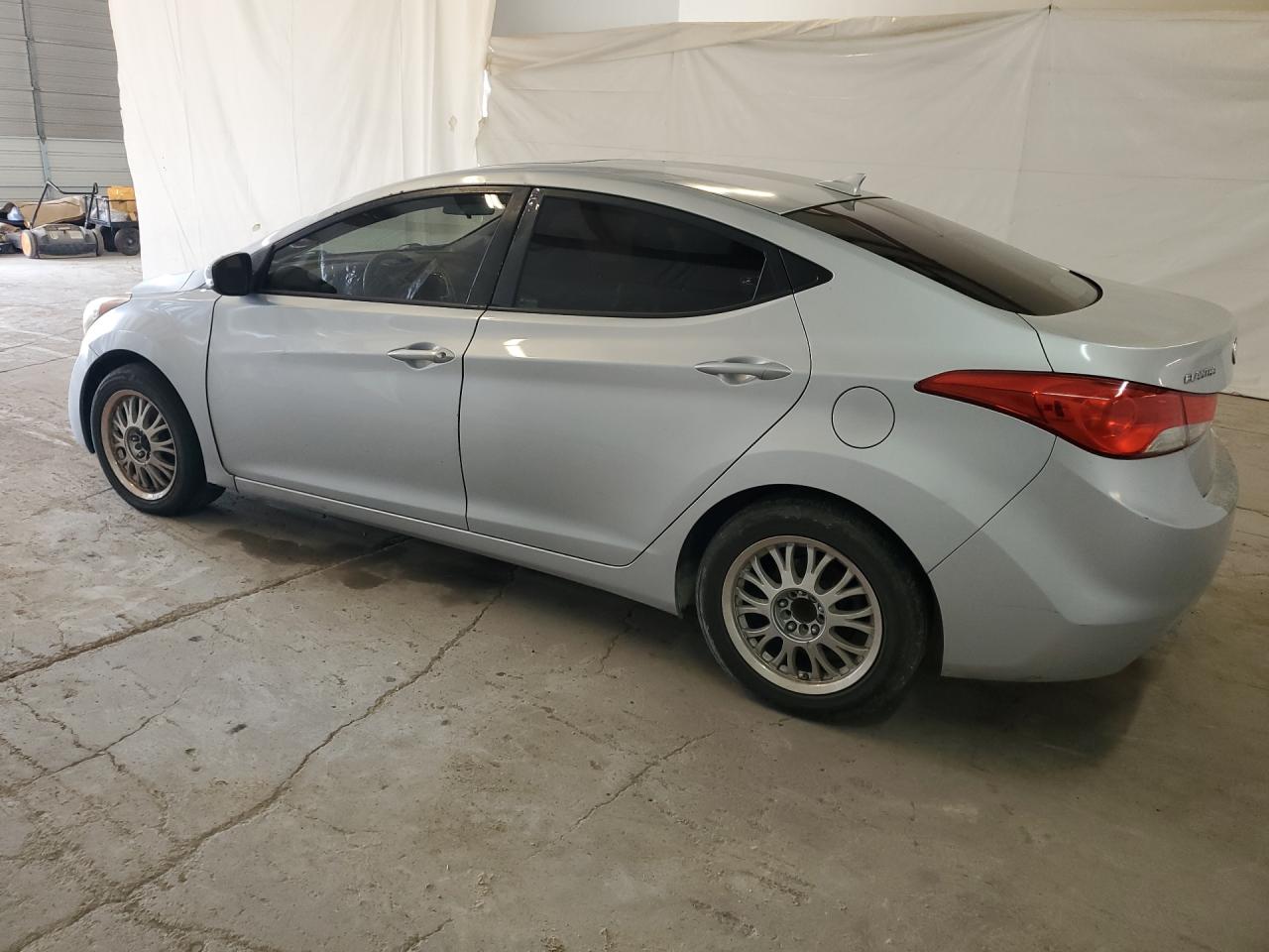 2012 Hyundai Elantra Limited Silver vin: 5NPDH4AE5CH092662 Damage: Left Rocker Panel, Dent(S) W/ Paint Dmg, 1/8 To 1/2 Inch