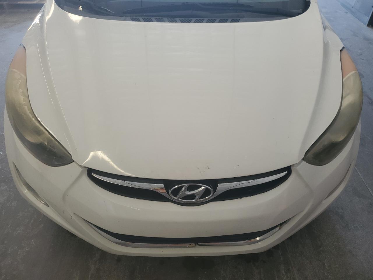 2013 Hyundai Elantra Gls White vin: 5NPDH4AE6DH340905 Damage: Front Bumper Cen. Grille-Scrn, Broken, Replacement Required