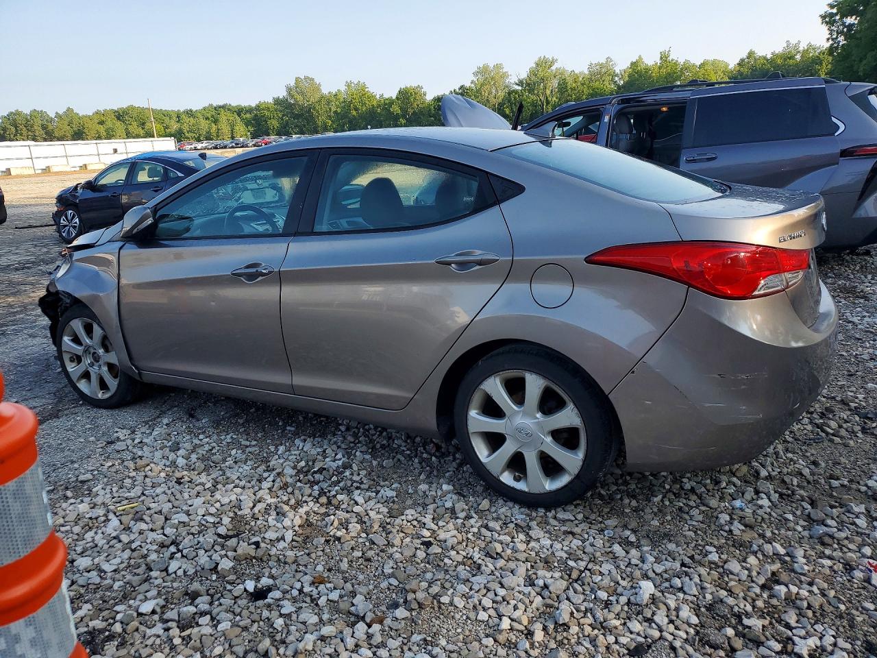 2012 Hyundai Elantra Limited Желто-коричневый vin: 5NPDH4AE8CH101452