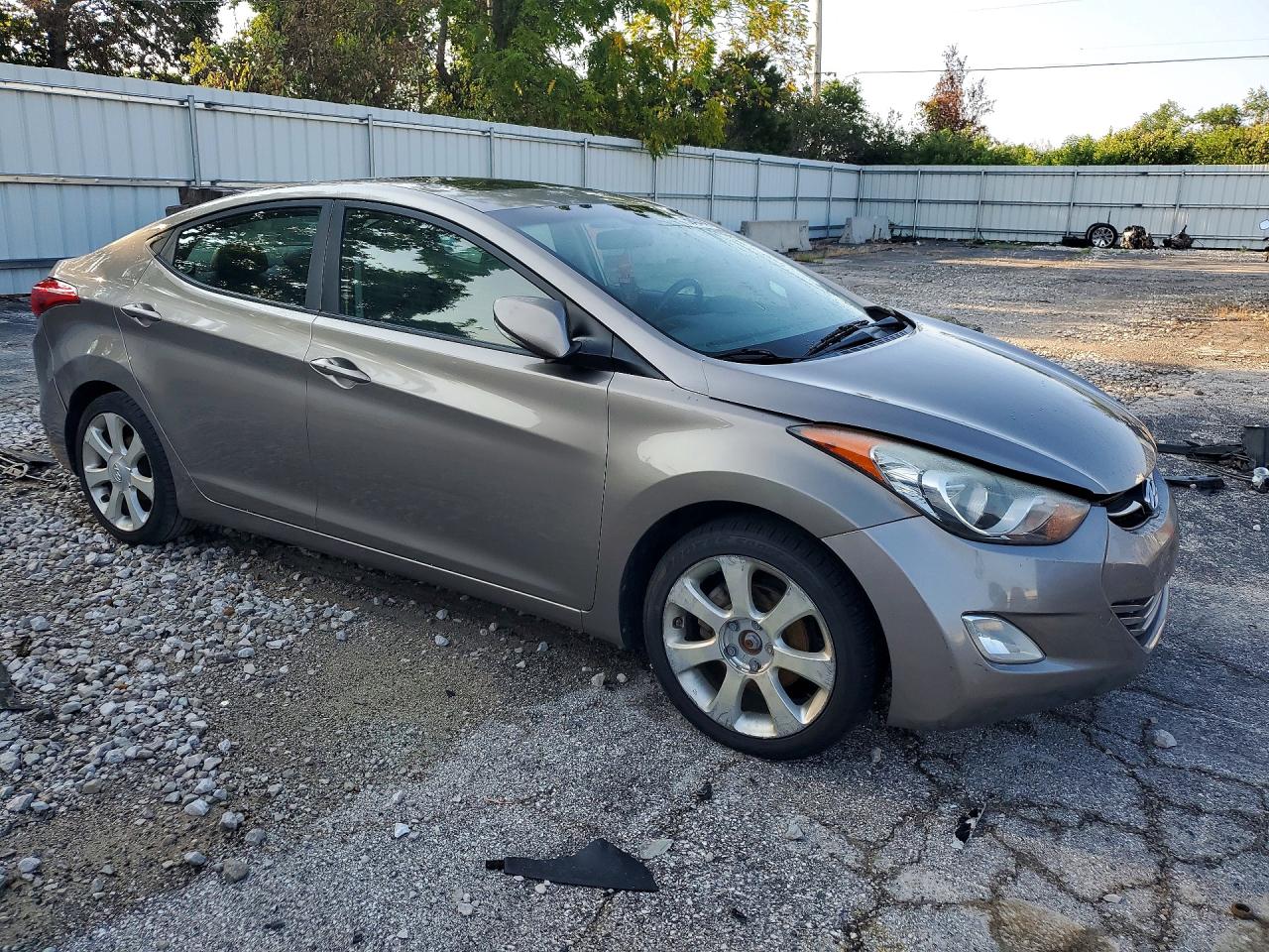 2012 Hyundai Elantra Limited Желто-коричневый vin: 5NPDH4AE8CH101452