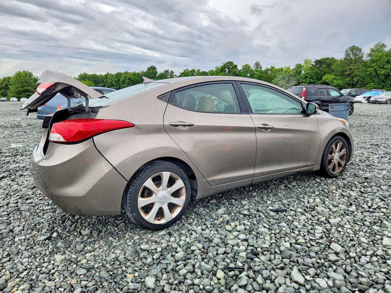 2013 Hyundai Elantra Limited Желто-коричневый vin: 5NPDH4AEXDH259440