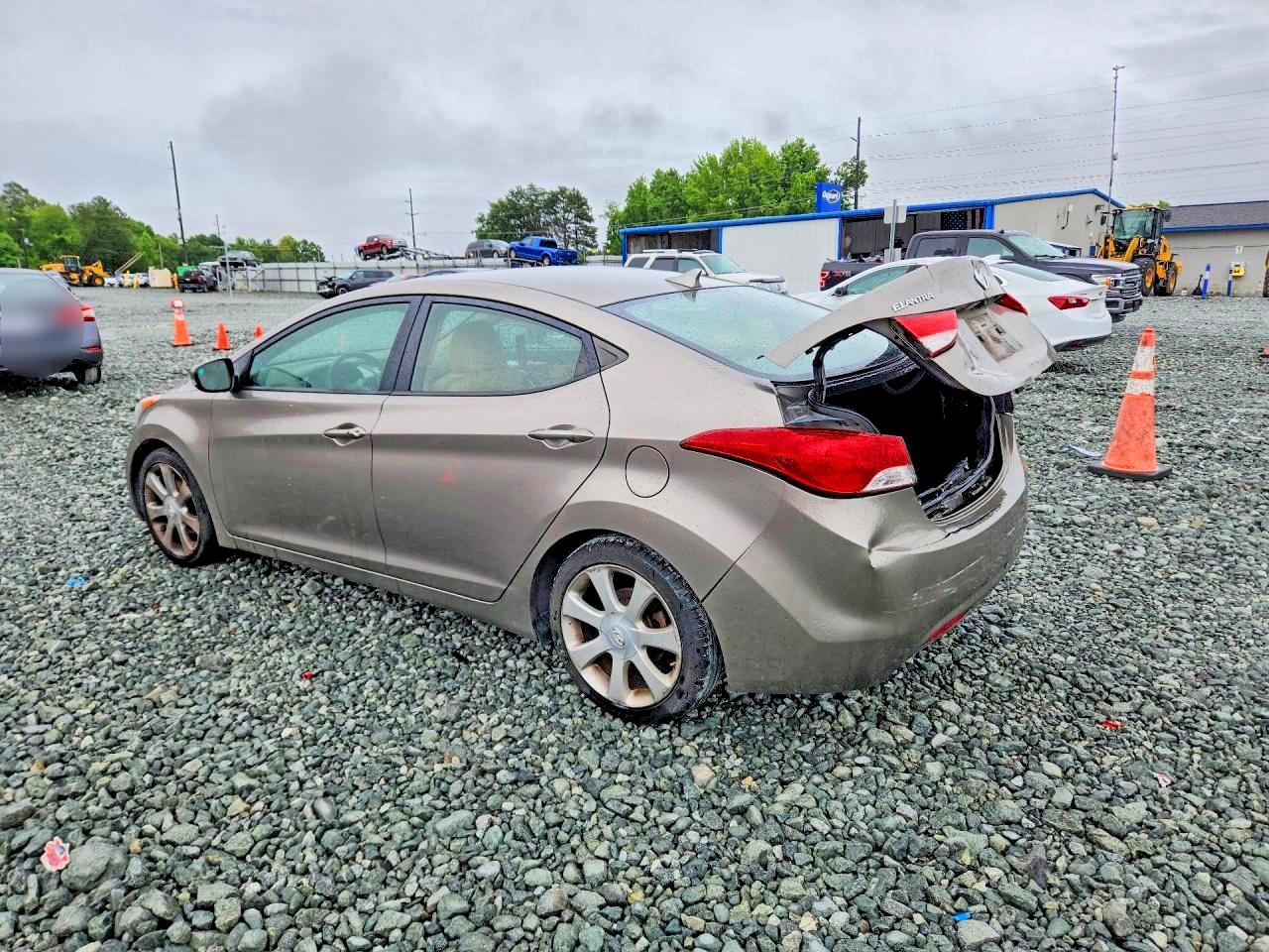 2013 Hyundai Elantra Limited Желто-коричневый vin: 5NPDH4AEXDH259440