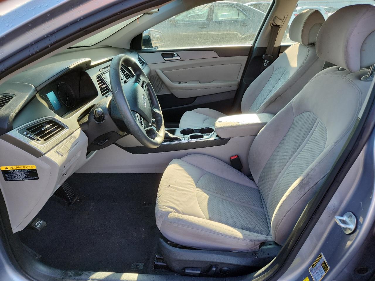 2015 Hyundai Sonata Eco Silver vin: 5NPE24AA3FH133233 Damage: Left Front Seat Cushion, Burn Hole, 1/2 To 1 Inch