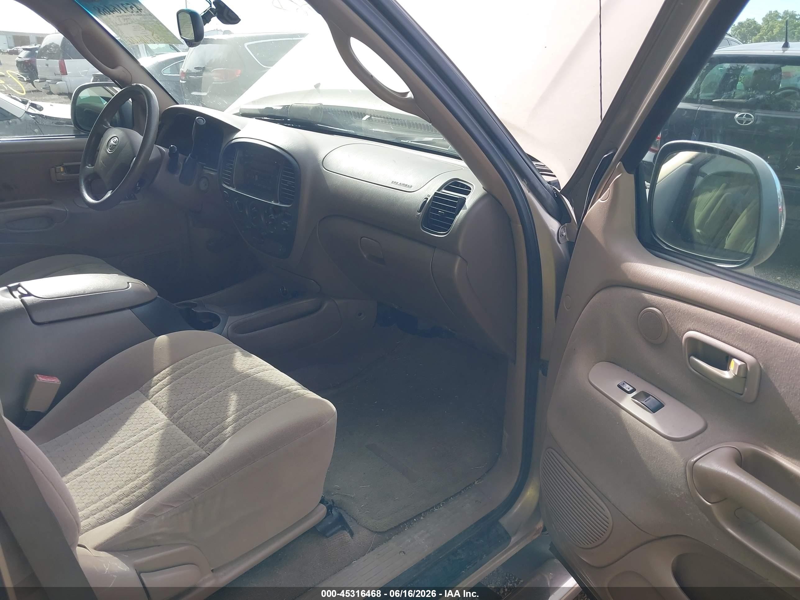 2003 Toyota Tundra Sr5 V8 Champagne vin: 5TBBT44113S404512